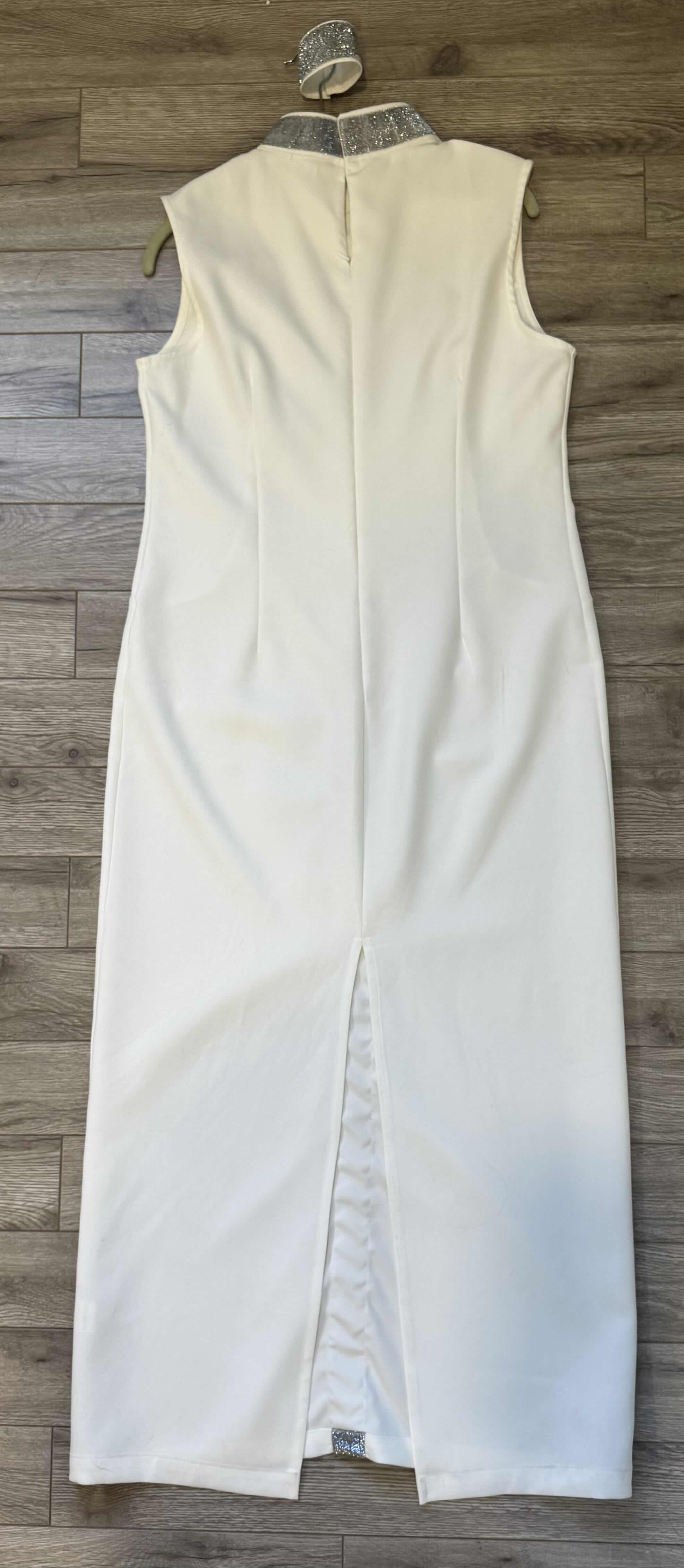Photo 1 of WHITE W SILVER TRIM SHORT SLEEVE EVENING GOWN W SHORT WHITE VEIL (SIZE L)
