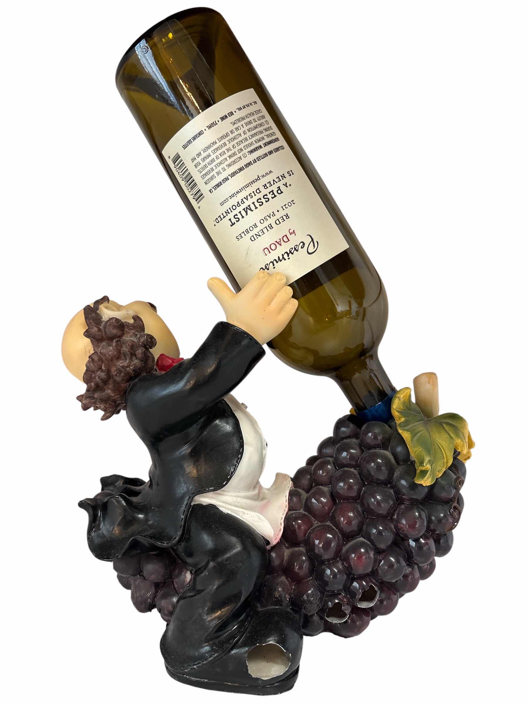 Photo 1 of CHEF RESIN WINE HOLDER H8” $35