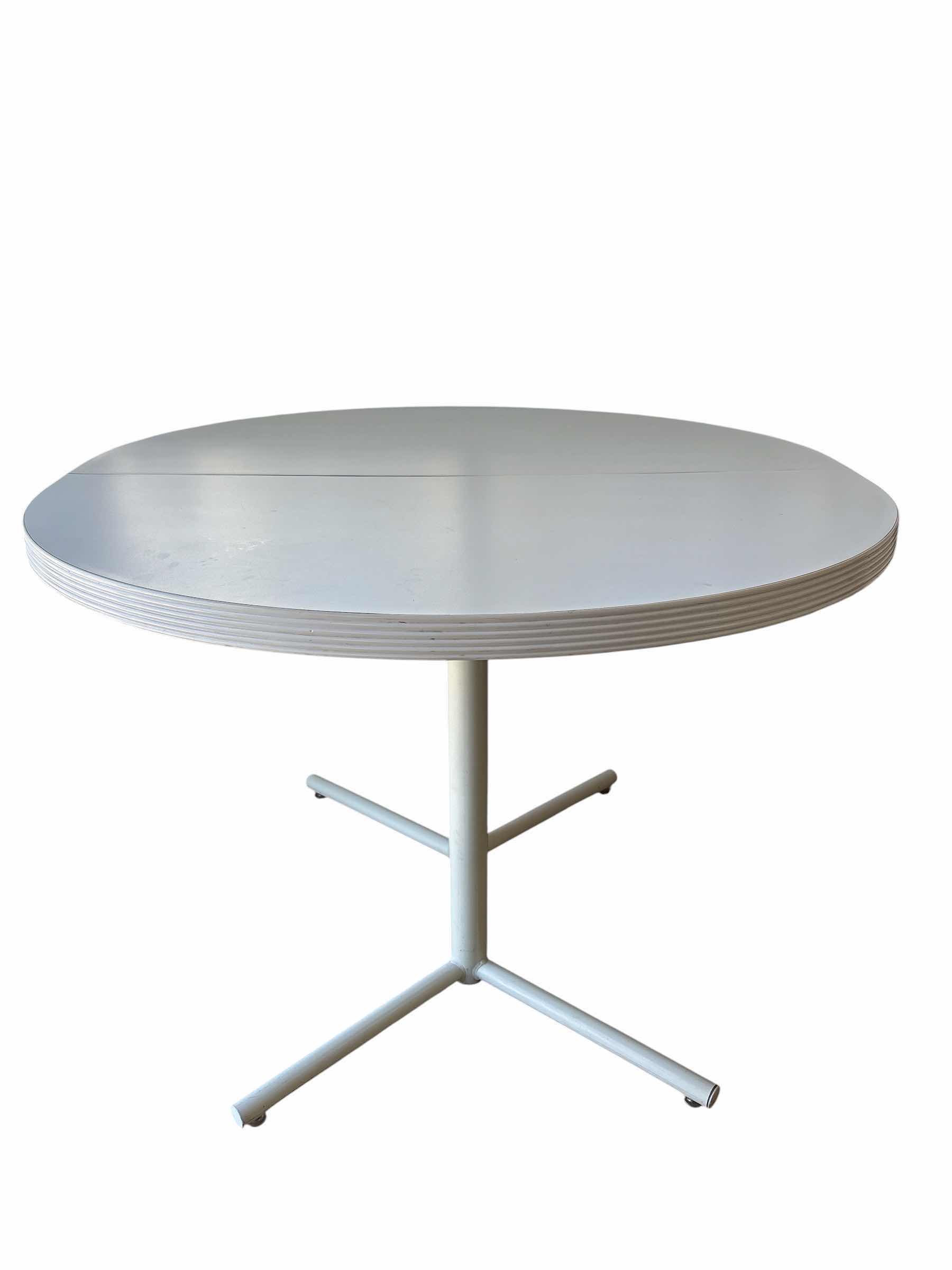 Photo 1 of RETRO WHITE ROUND TABLE W METAL LEGS 42”
