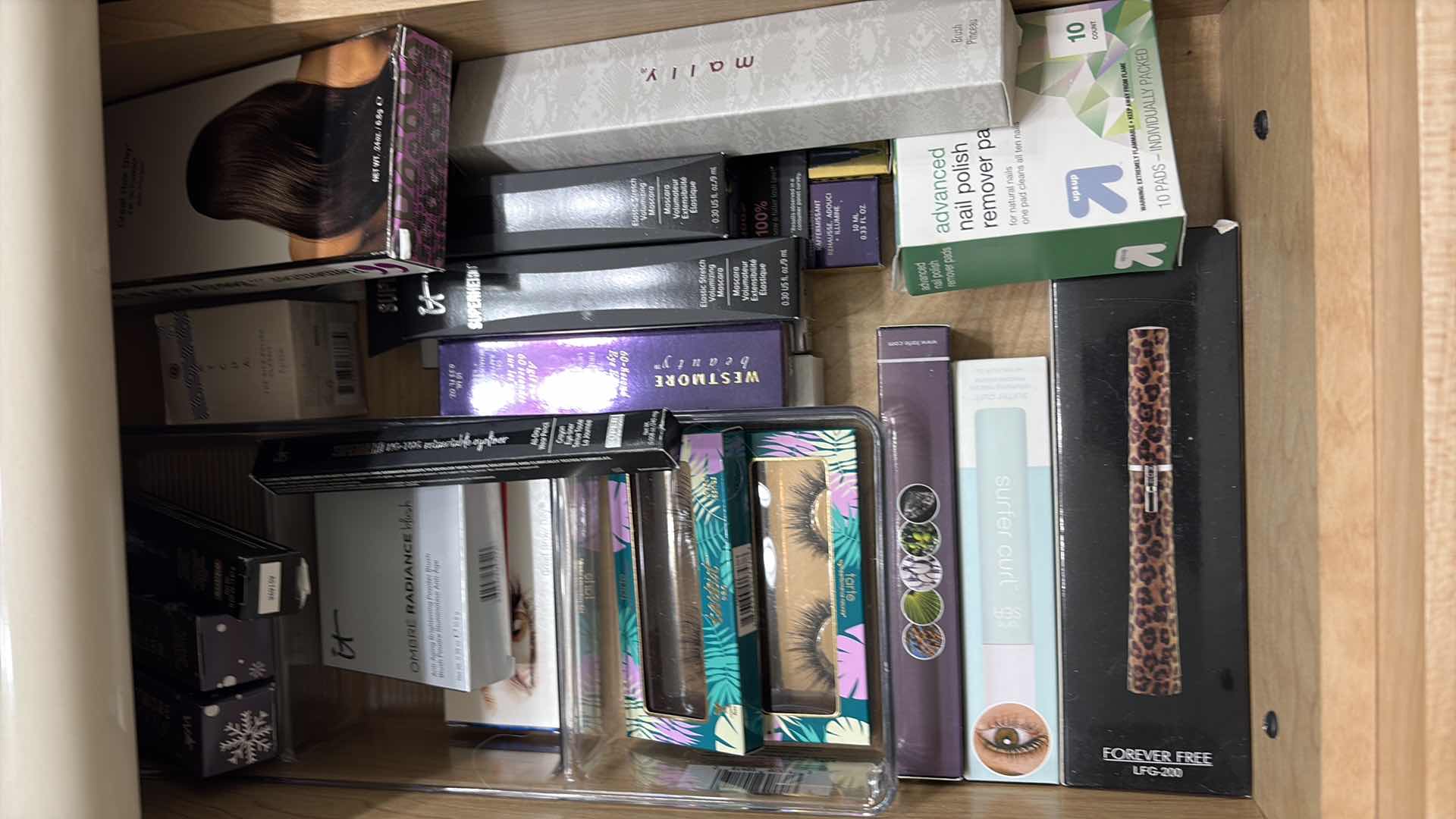 Photo 1 of CONTENTS OF PRIMARY BATHROOM DRAWERS-MAKEUP,EYELASHES & HAIR ITEMS