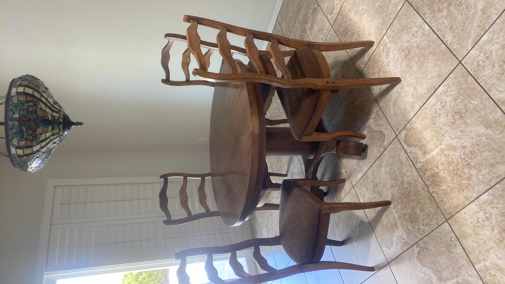 Photo 1 of 42” ROUND WOOD OAK TABLE WITH 3 LEAFS 9” AND FOUR CHAIRS H30”