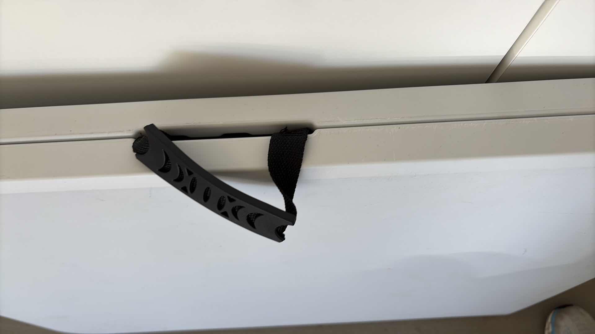 Photo 1 of LIGHTWEIGHT FOLDABLE UTILITY PLASTIC TABLE W/HANDLE 6’