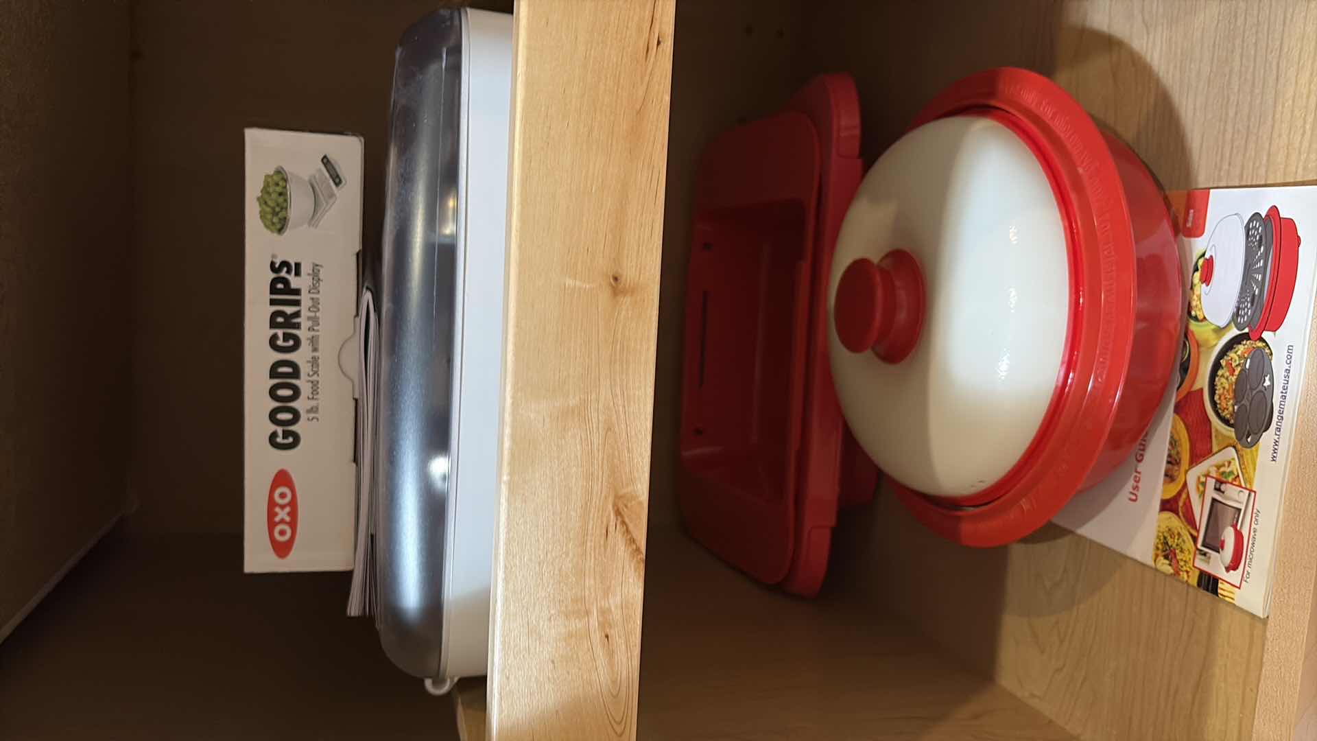 Photo 1 of CONTENTS OF KITCHEN CABINET