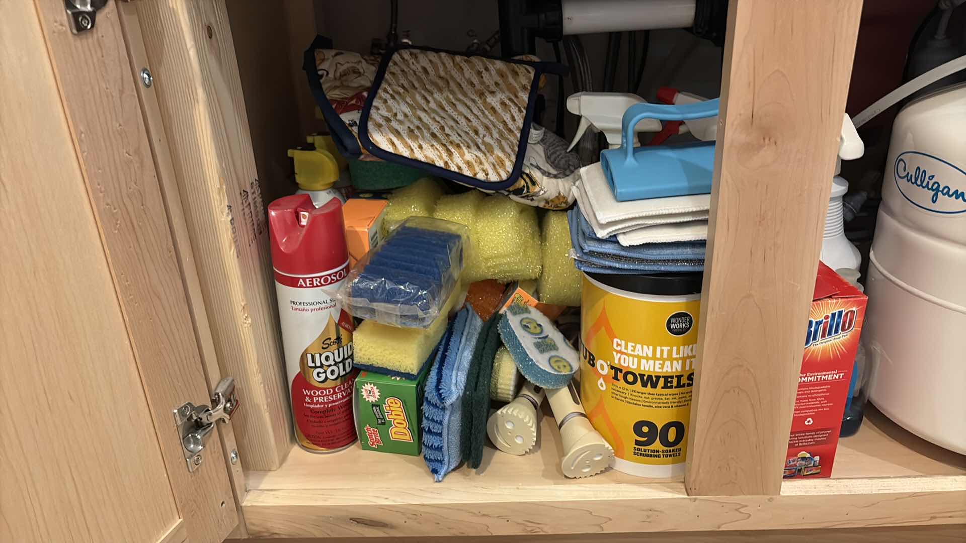 Photo 1 of CONTENTS OF CABINET UNDERNEATH SINK