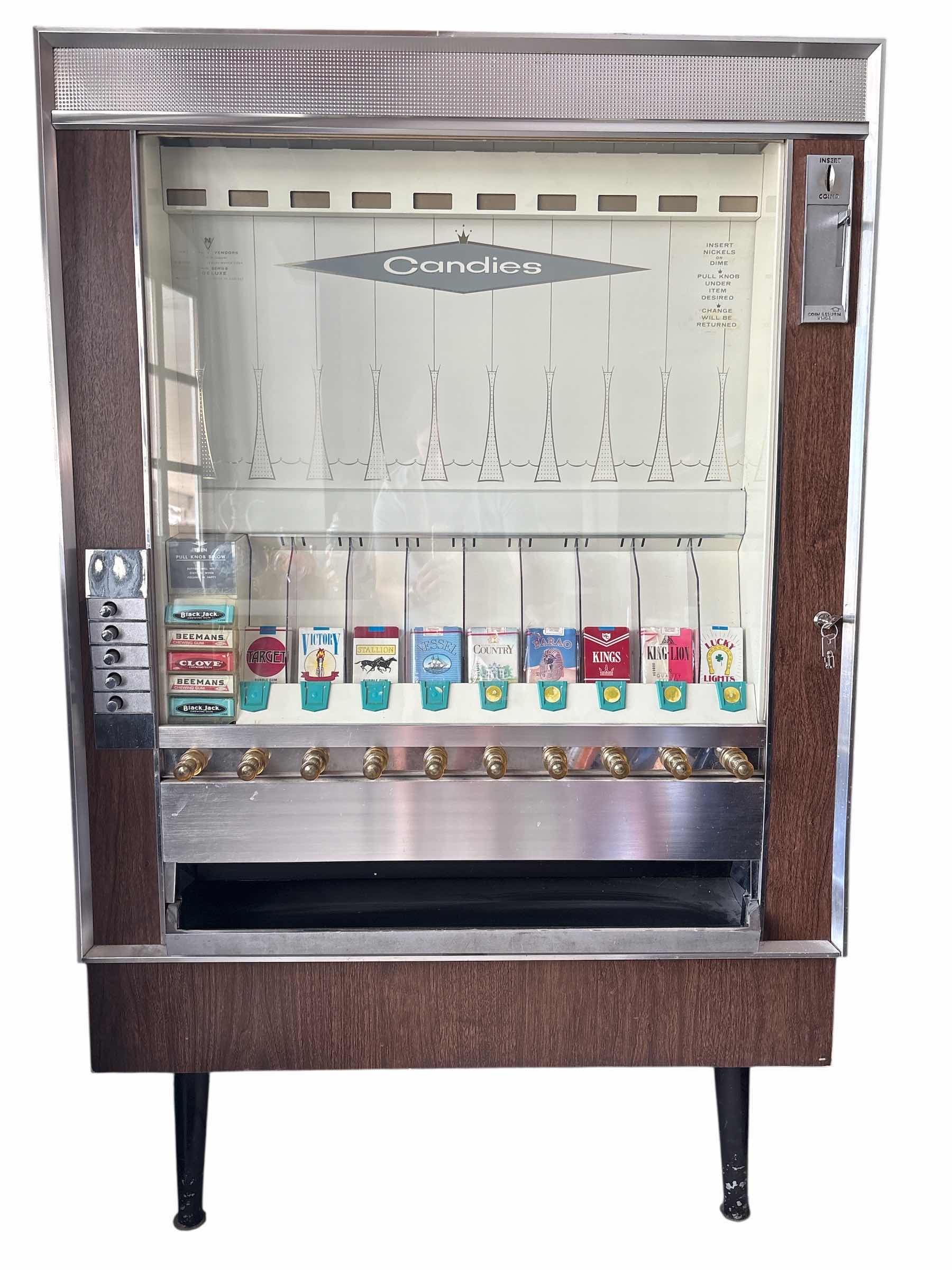 Photo 1 of VINTAGE CANDIES CIGARETTE AND CHEWING GUM VENDING MACHINE WITH KEY 35”X15”H54”