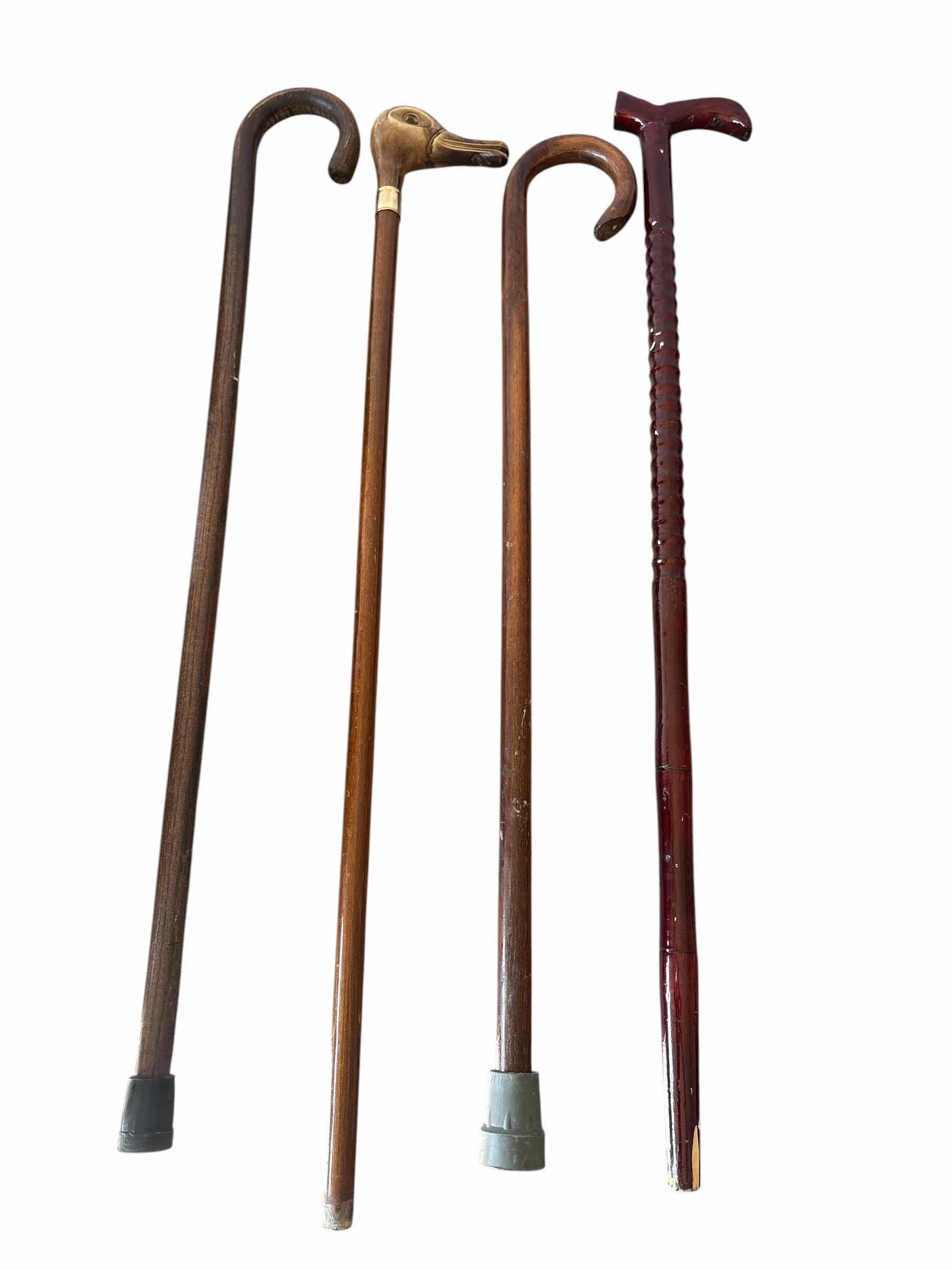 Photo 1 of (4)PCS WOOD WALKING CANES H35”