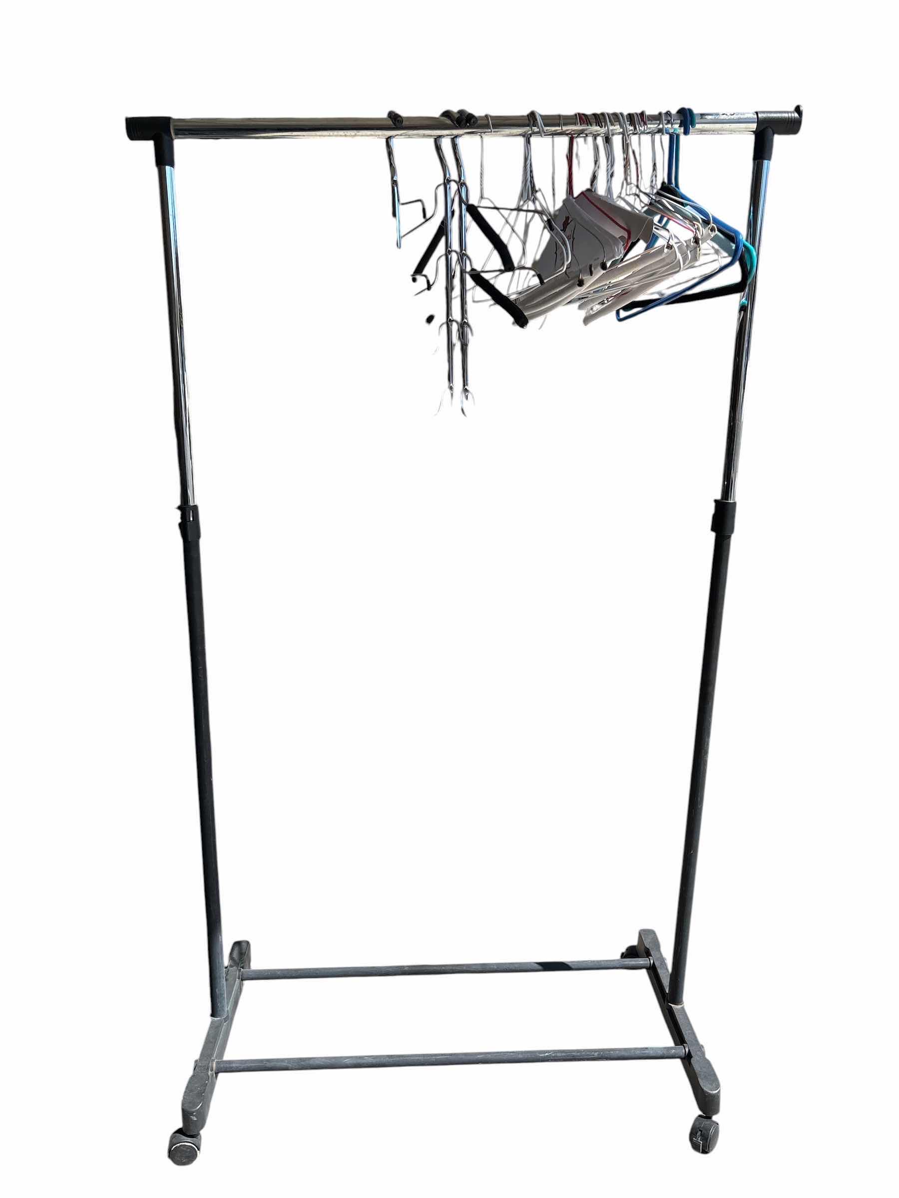 Photo 1 of PLASTIC ROLLING CLOTHING RACK W HANGERS H57”