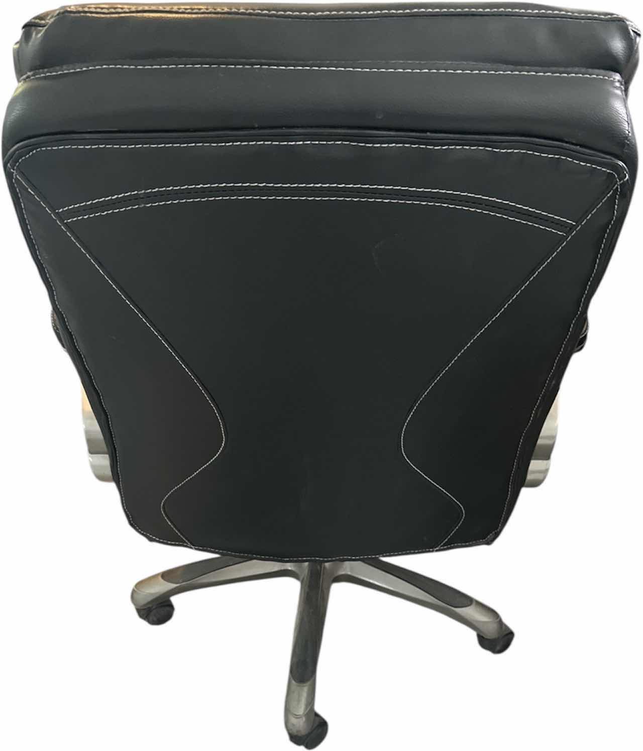 Photo 1 of BLACK LEATHER EXECUTIVE STYLE OFFICE CHAIR
26” X 24” X H 41”