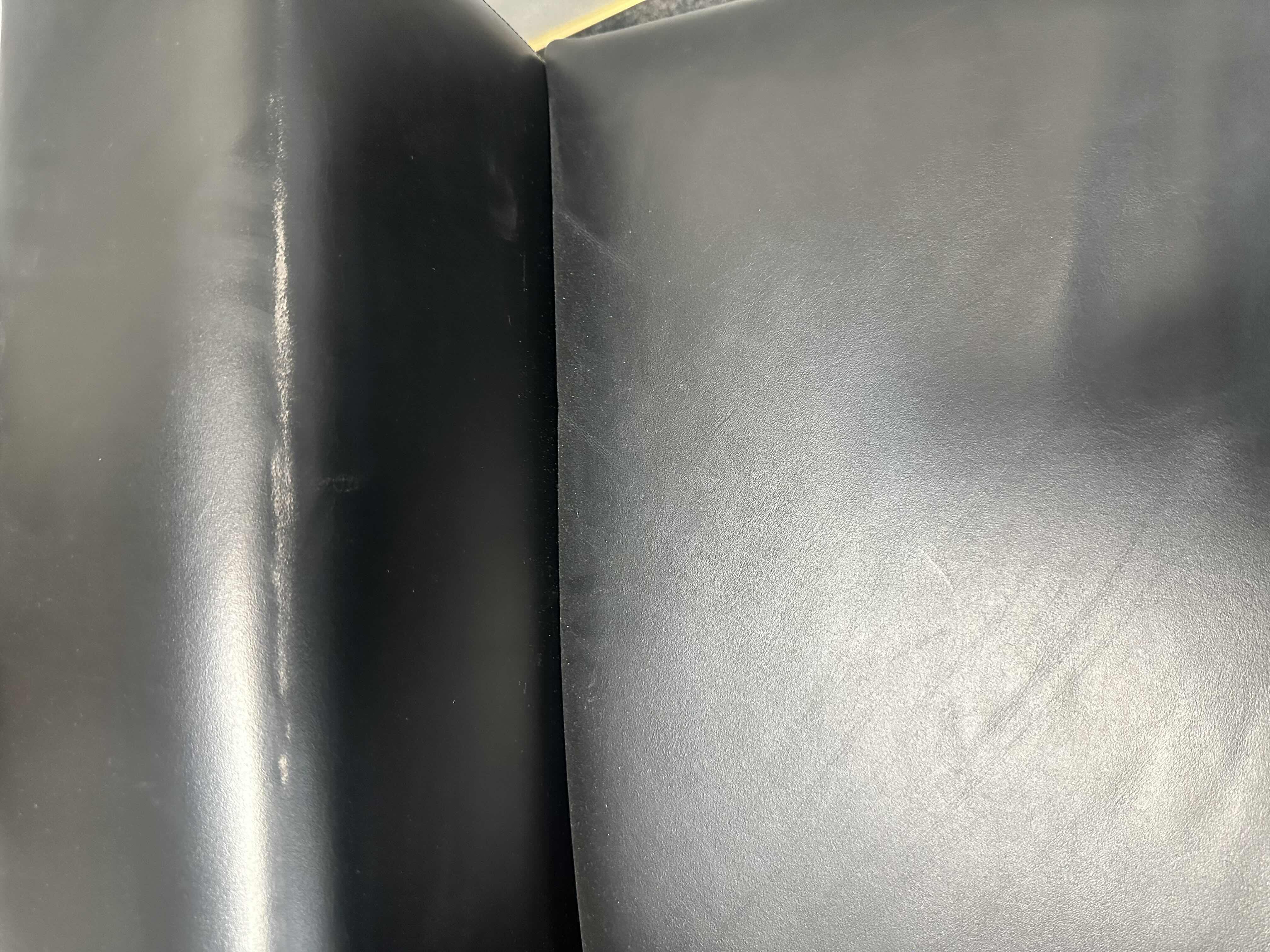 Photo 1 of BLACK LEATHER ARMCHAIR 
34.25” X 31” X 31” H