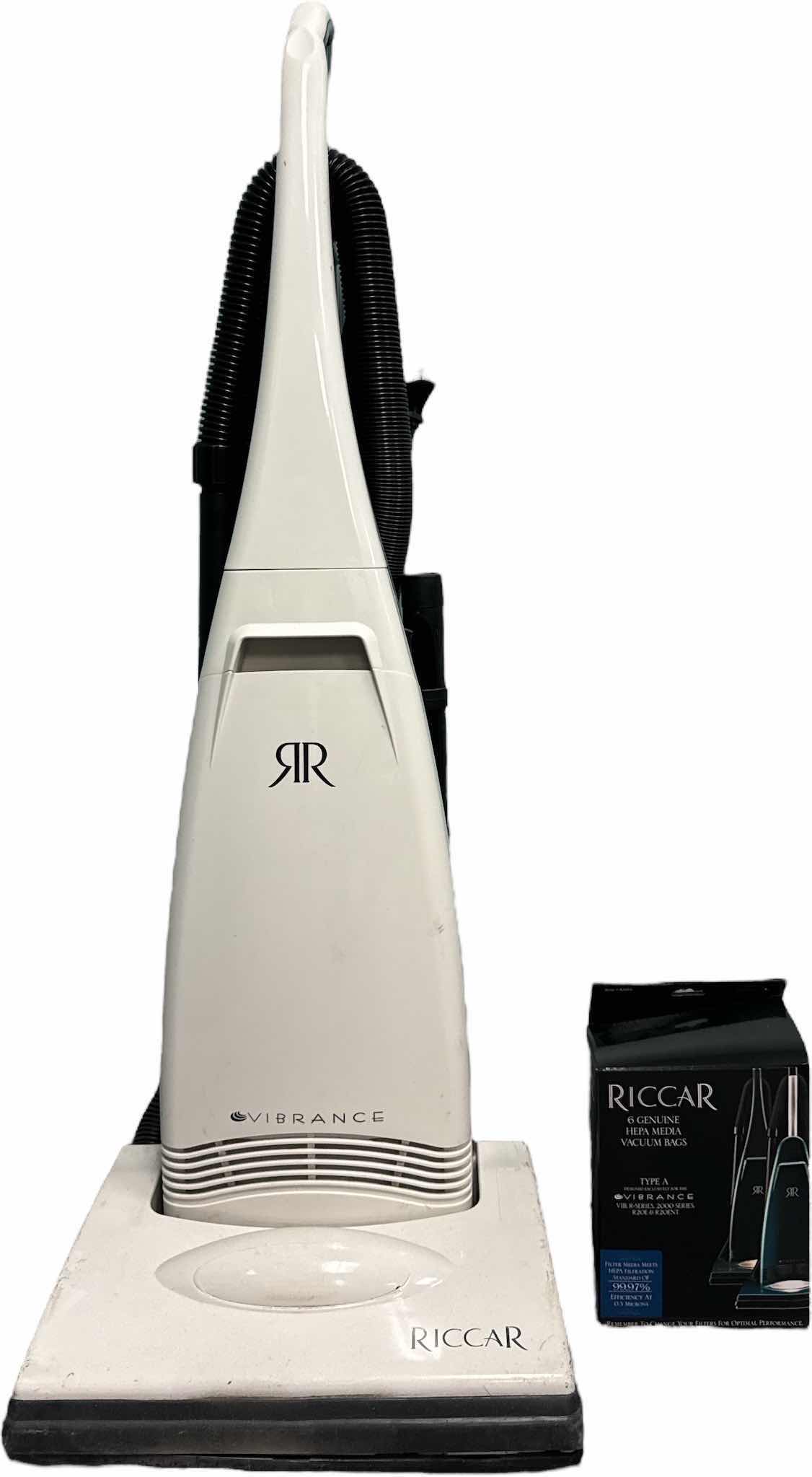 Photo 1 of VINTAGE RICCAR VIBRANCE VACUUM WITH VACUUM BAGS, OWNERS MANUAL INCLUDED
15” X 14” X H44”