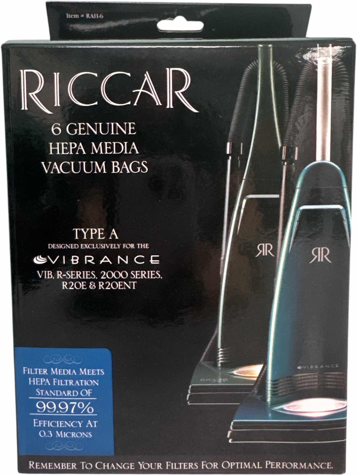 Photo 1 of VINTAGE RICCAR VIBRANCE VACUUM WITH VACUUM BAGS, OWNERS MANUAL INCLUDED 
15” X 14” X H44”