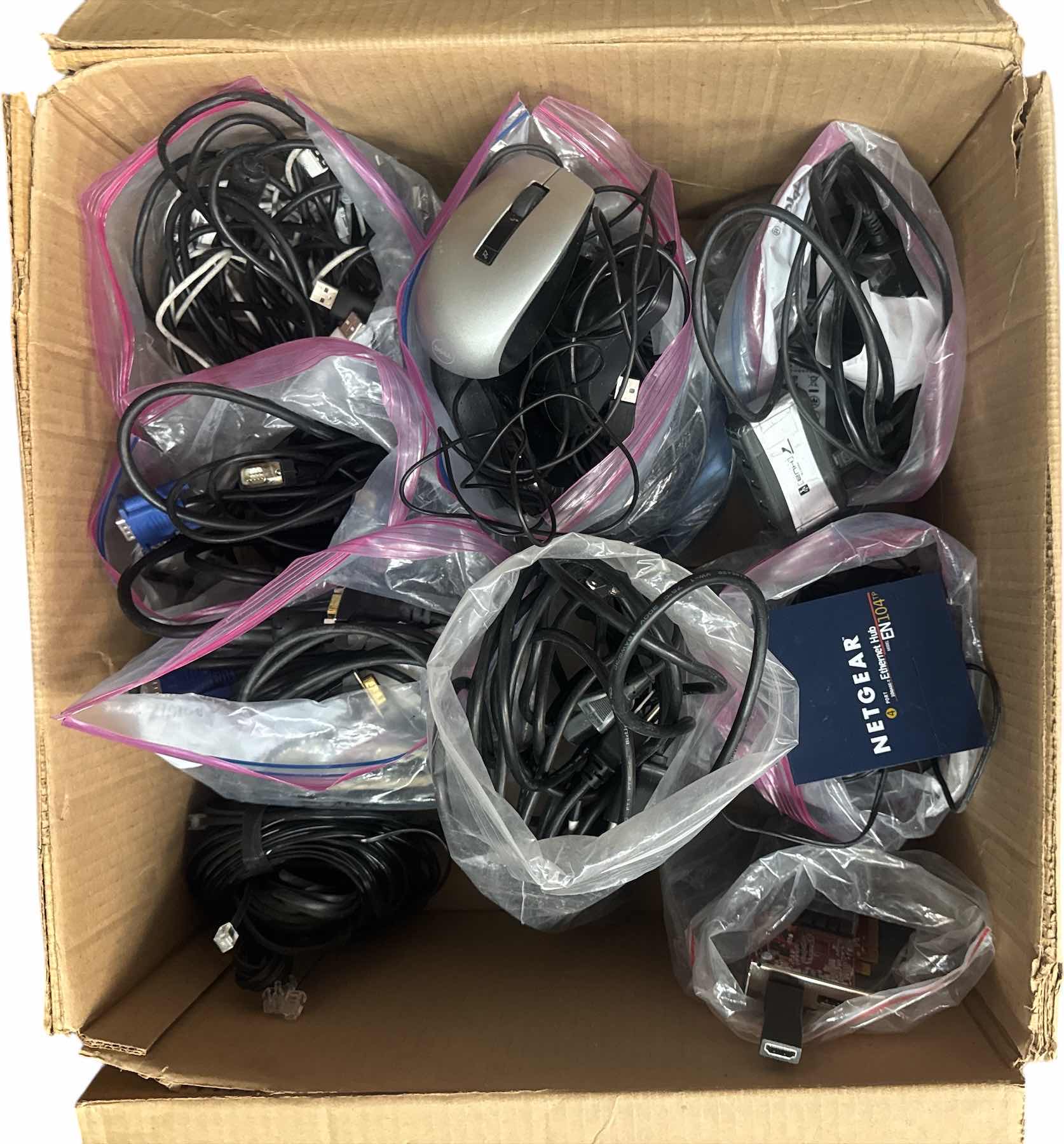 Photo 1 of BOX OF ASSORTED COMPUTER CABLES, POWER CORDS, WIRED MOUSE, HDMI, PRINT SERVERS HP JET 175X, MEMORY CHIPS
BOX
19” X 18” X H9”
