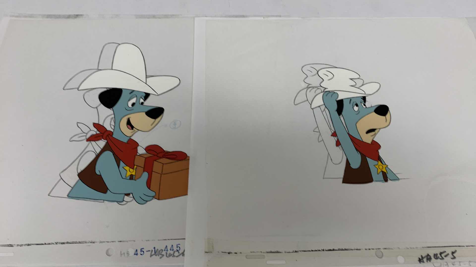 Photo 1 of VINTAGE HANNA BARBERA HAND PAINTED ANIMATION CEL WITH HUCKLEBERRY HOUND 8” X 10”