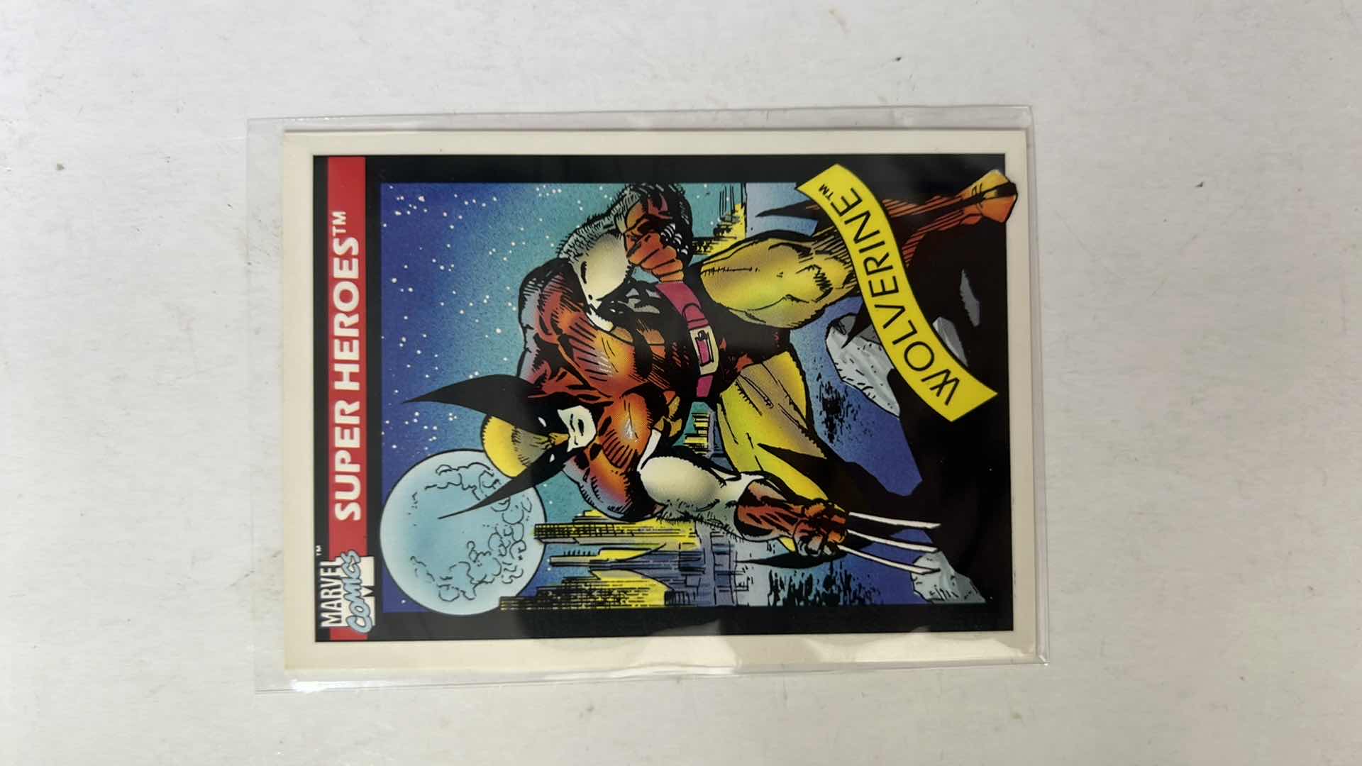 Photo 1 of 1990 IMPEL MARVEL UNIVERSE SUPER HEROES CARD 10 WOLVERINE $100