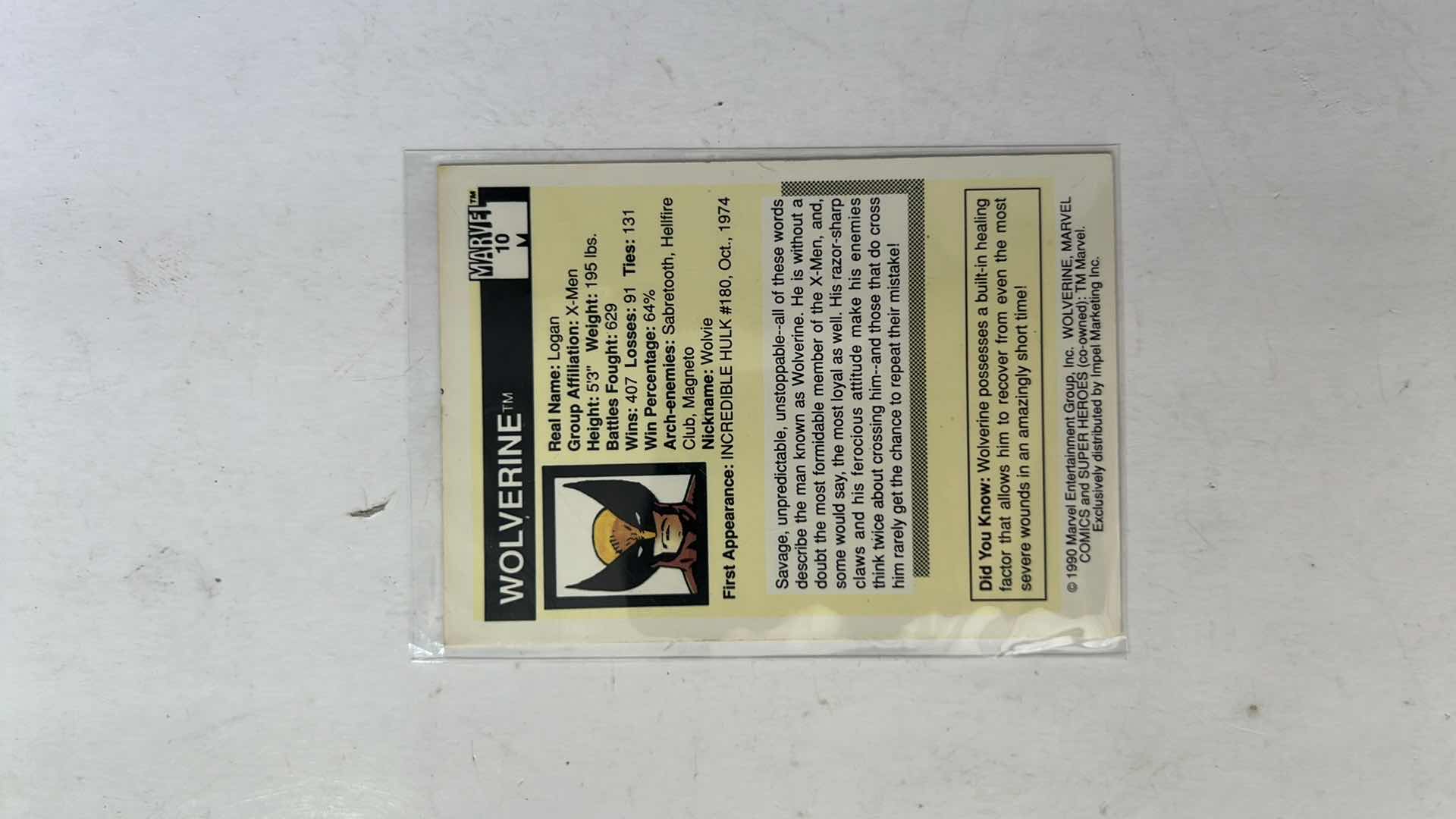 Photo 1 of 1990 IMPEL MARVEL UNIVERSE SUPER HEROES CARD 10 WOLVERINE $100