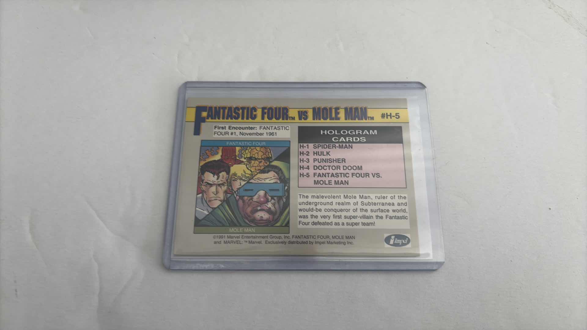 Photo 1 of MARVEL IMPEL TRADING CARD HOLOGRAPHIC “ FANTASTIC FOUR VS MOLE MAN “ SERIES II CARD #H-5