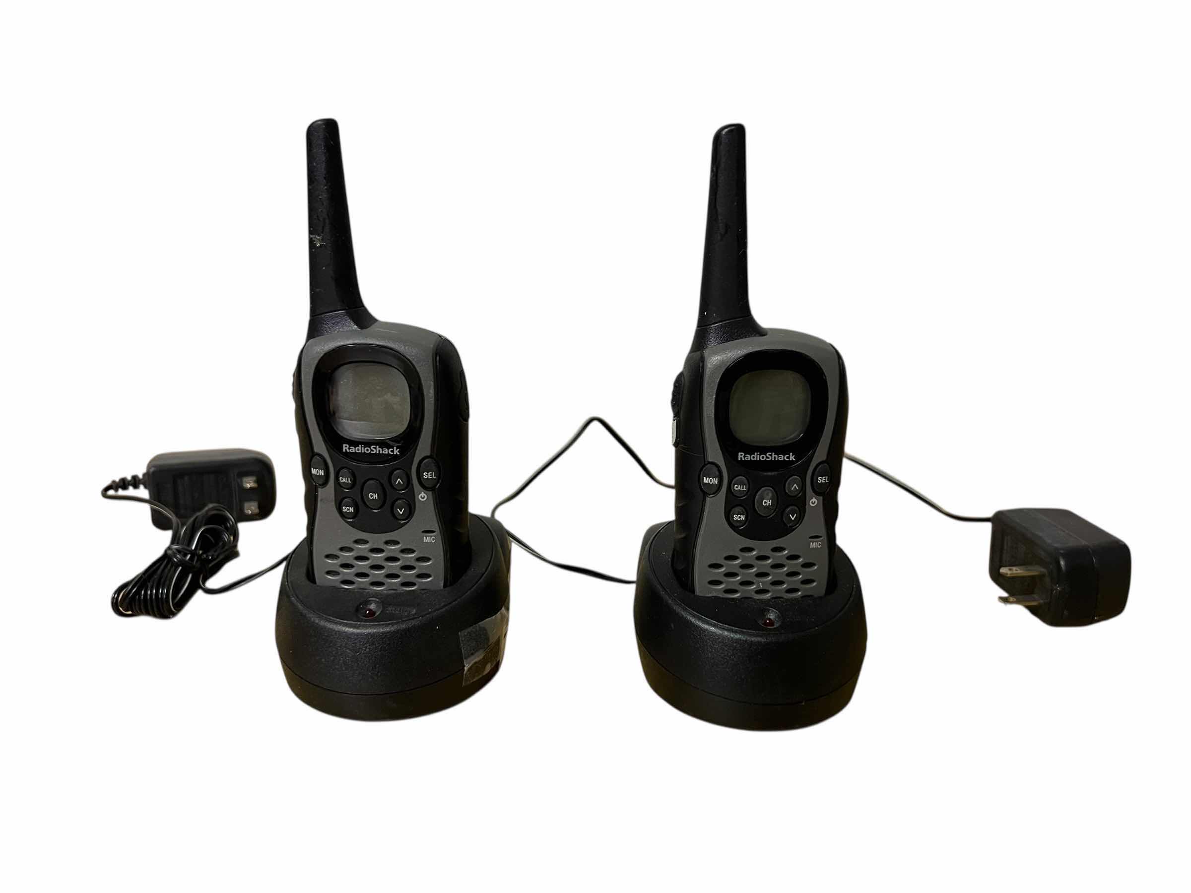 Photo 1 of SET OF RADIOSHACK WALKIE TALKIES WITH POWER BASES.