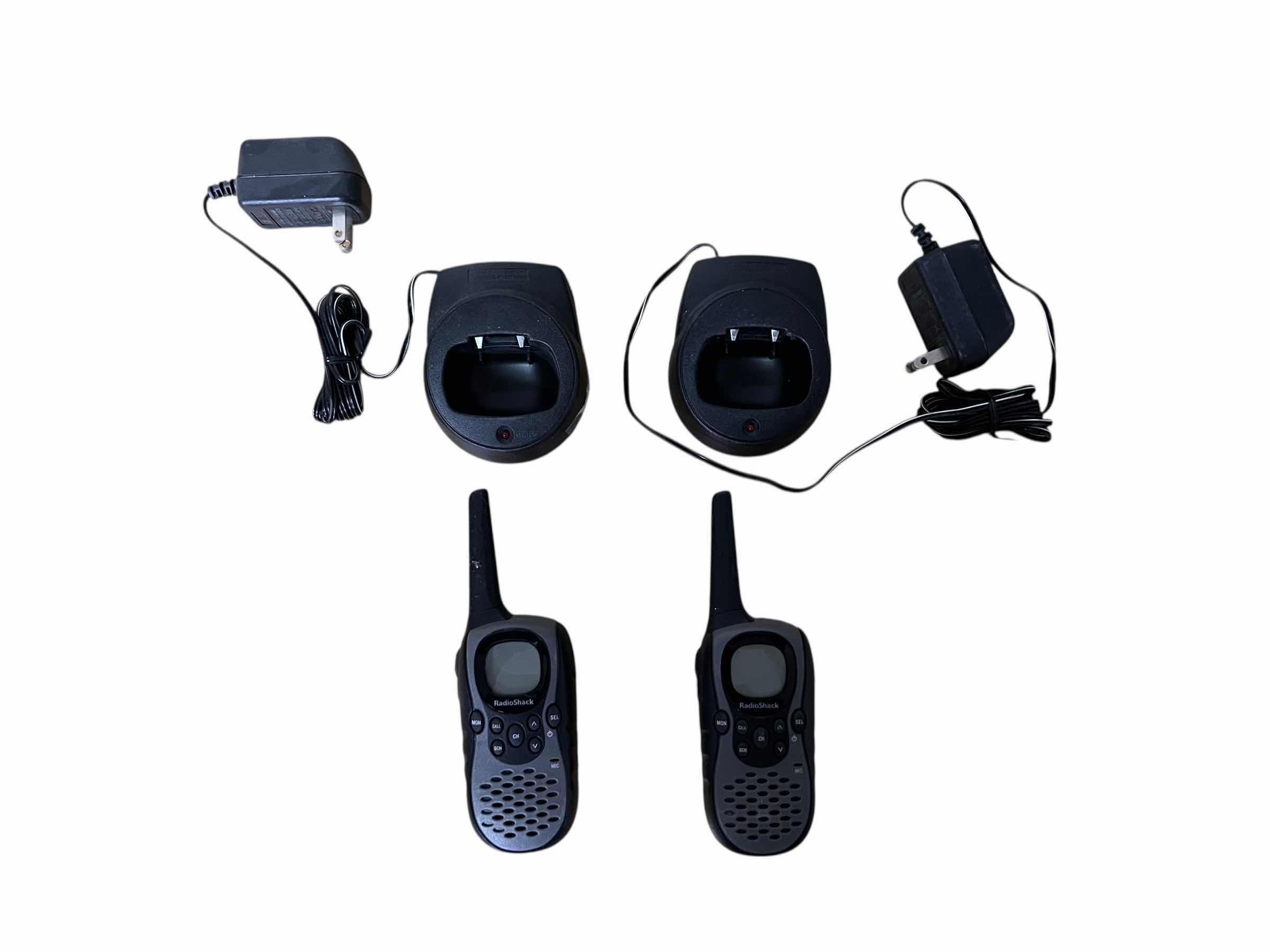 Photo 1 of SET OF RADIOSHACK WALKIE TALKIES WITH POWER BASES.