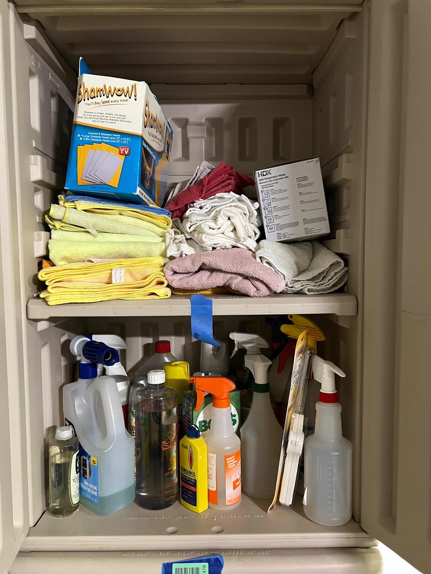 Photo 1 of CABINET FULL OF CLEANING ITEMS