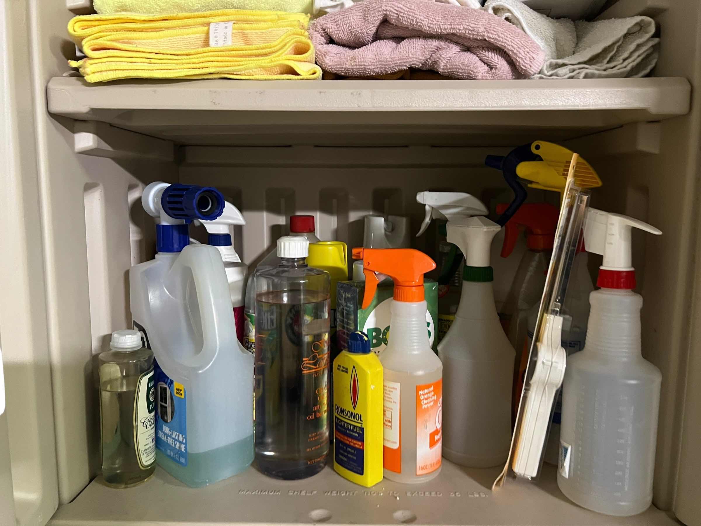 Photo 1 of CABINET FULL OF CLEANING ITEMS