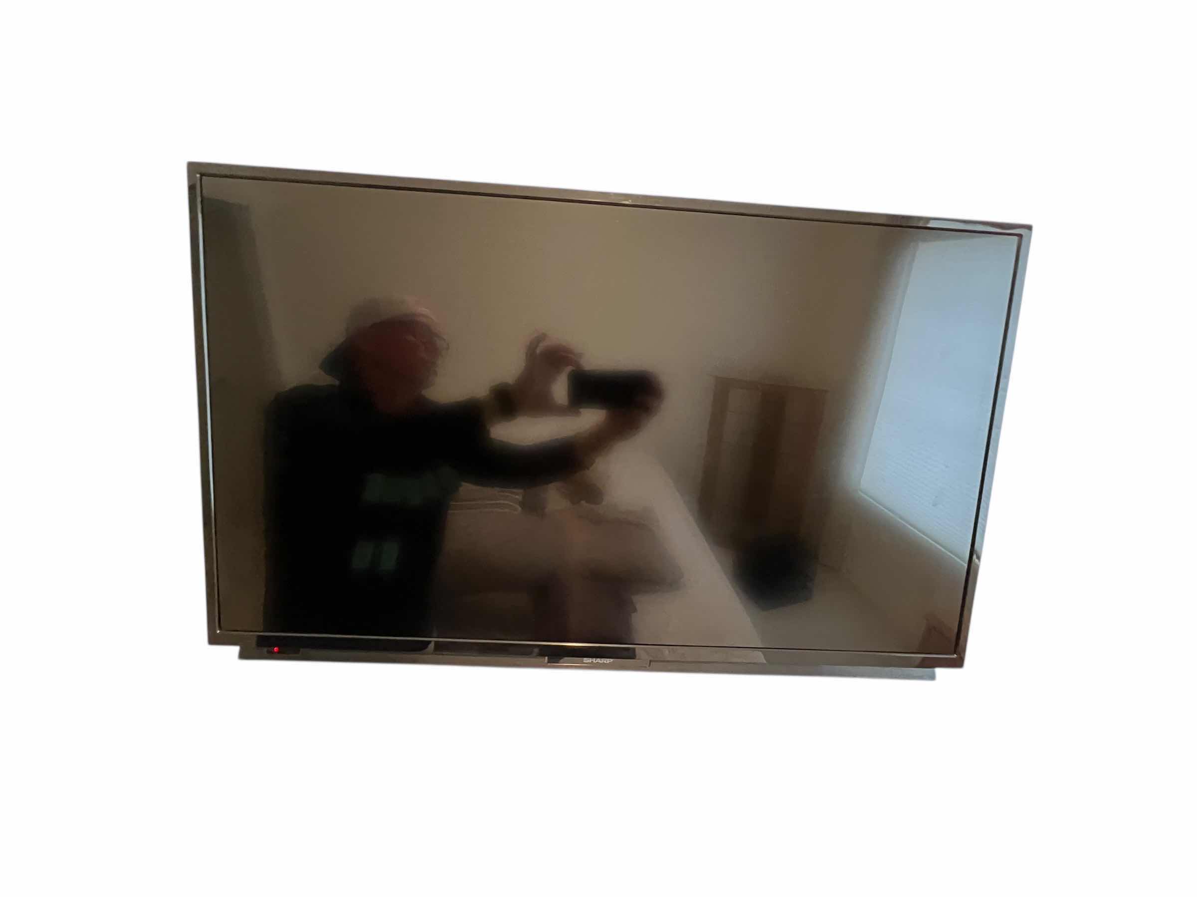 Photo 1 of SHARP 32” FLAT SCREEN TV WITH REMOTE IN WORKING CONDITION