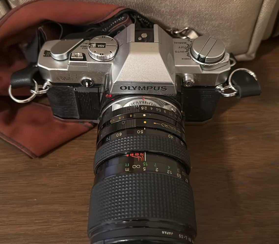 Photo 1 of OLYMPUS CAMERA W CARRYING CASE