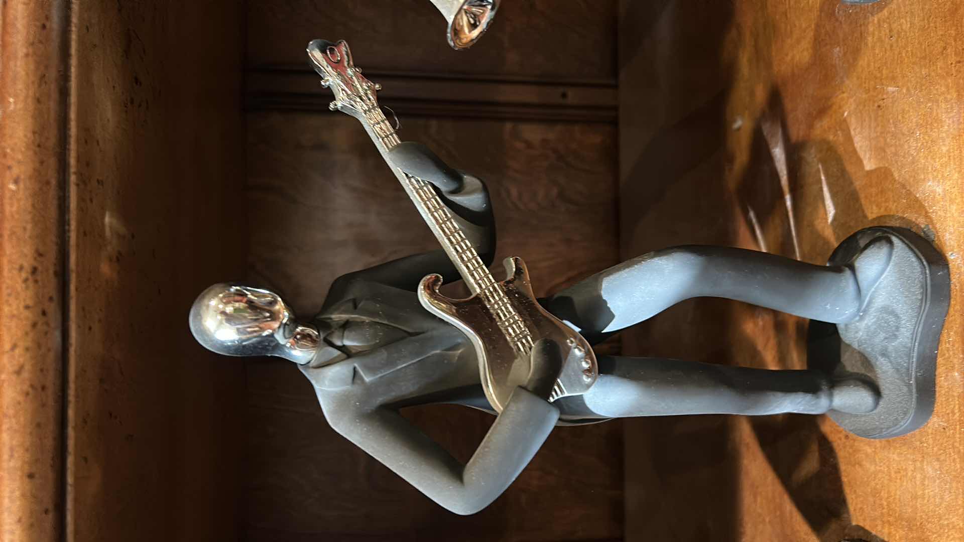 Photo 1 of 6 BLACK AND SILVER MUSICAL INSTRUMENT-PLAYING FIGURINES H 12”.