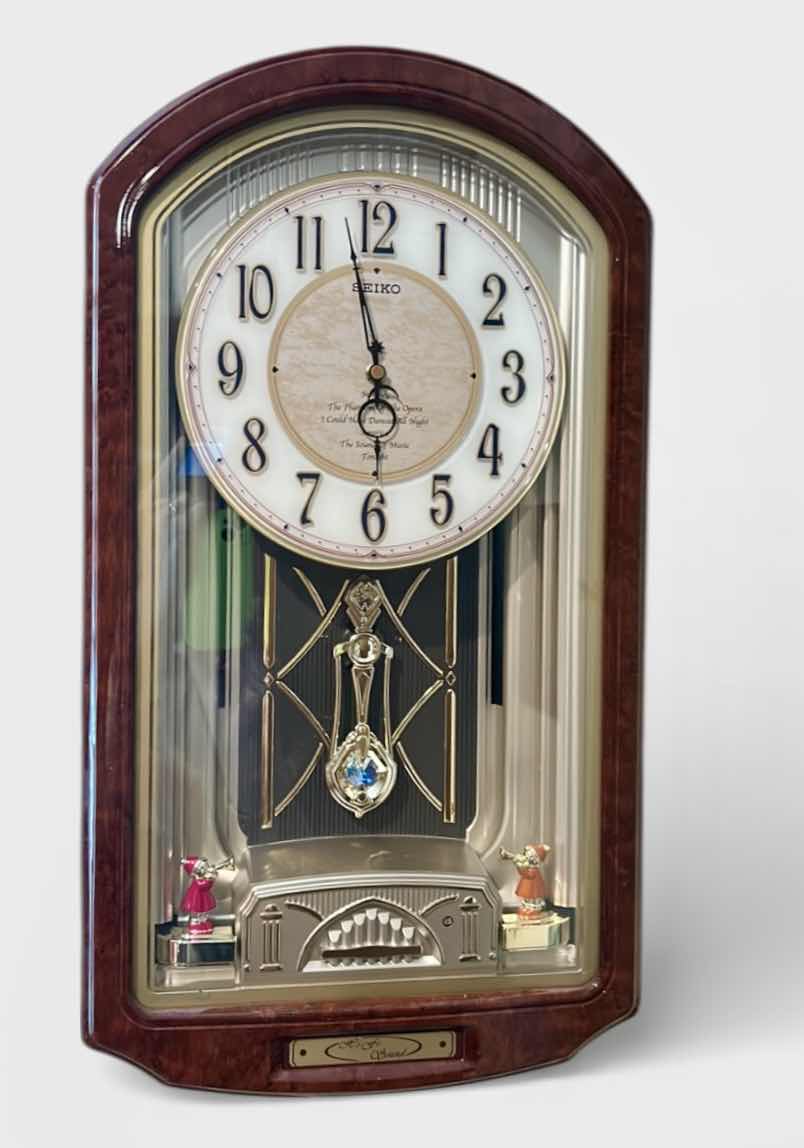 Photo 1 of SEIKO MELODIES IN MOTION MUSICAL WALL CLOCK. 12 1/2” x H23”