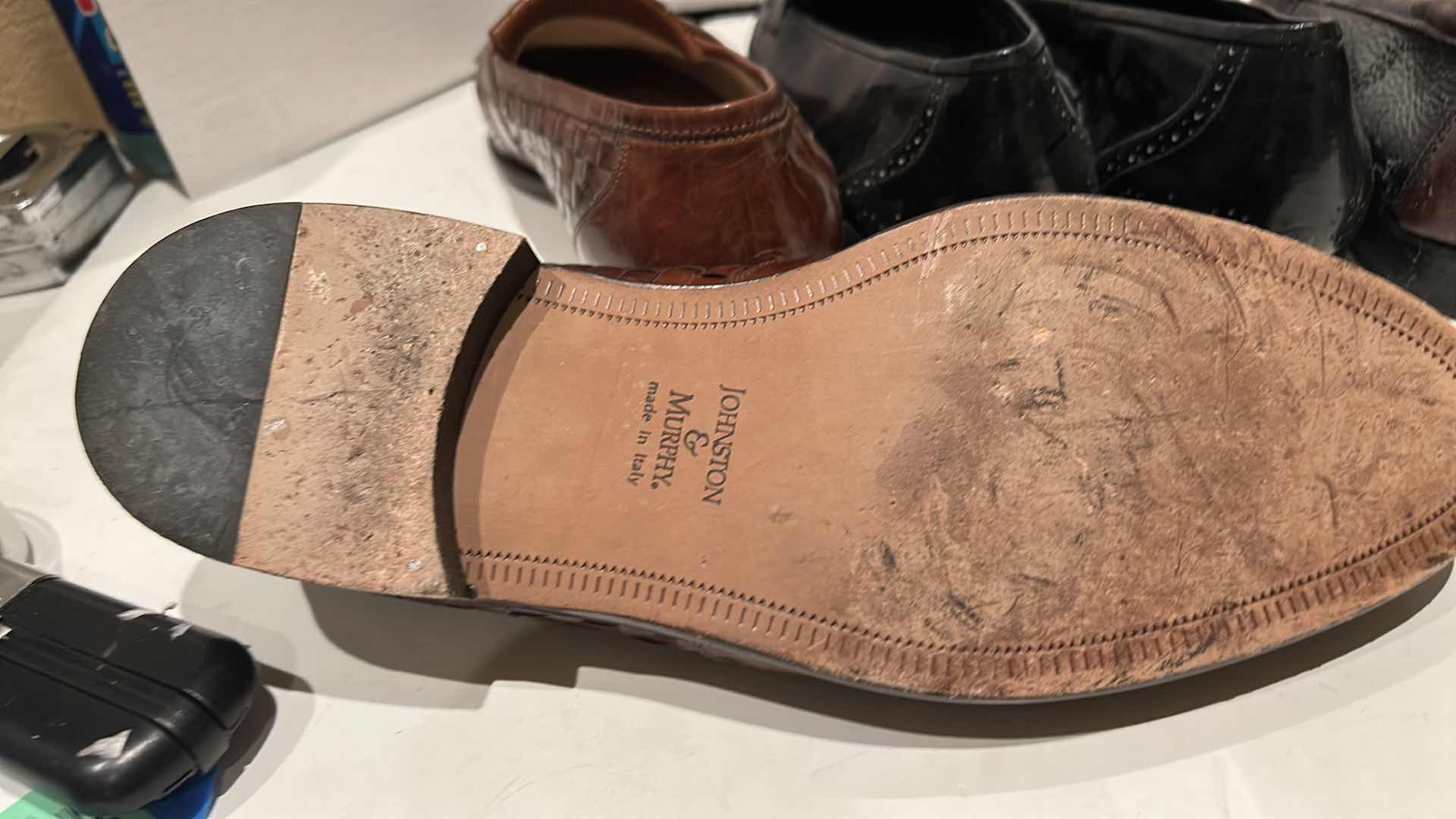 Photo 1 of THREE PAIRS DESIGNER JOHNSTON & MURPHY LEATHER LOAFERS, SIZE 10.