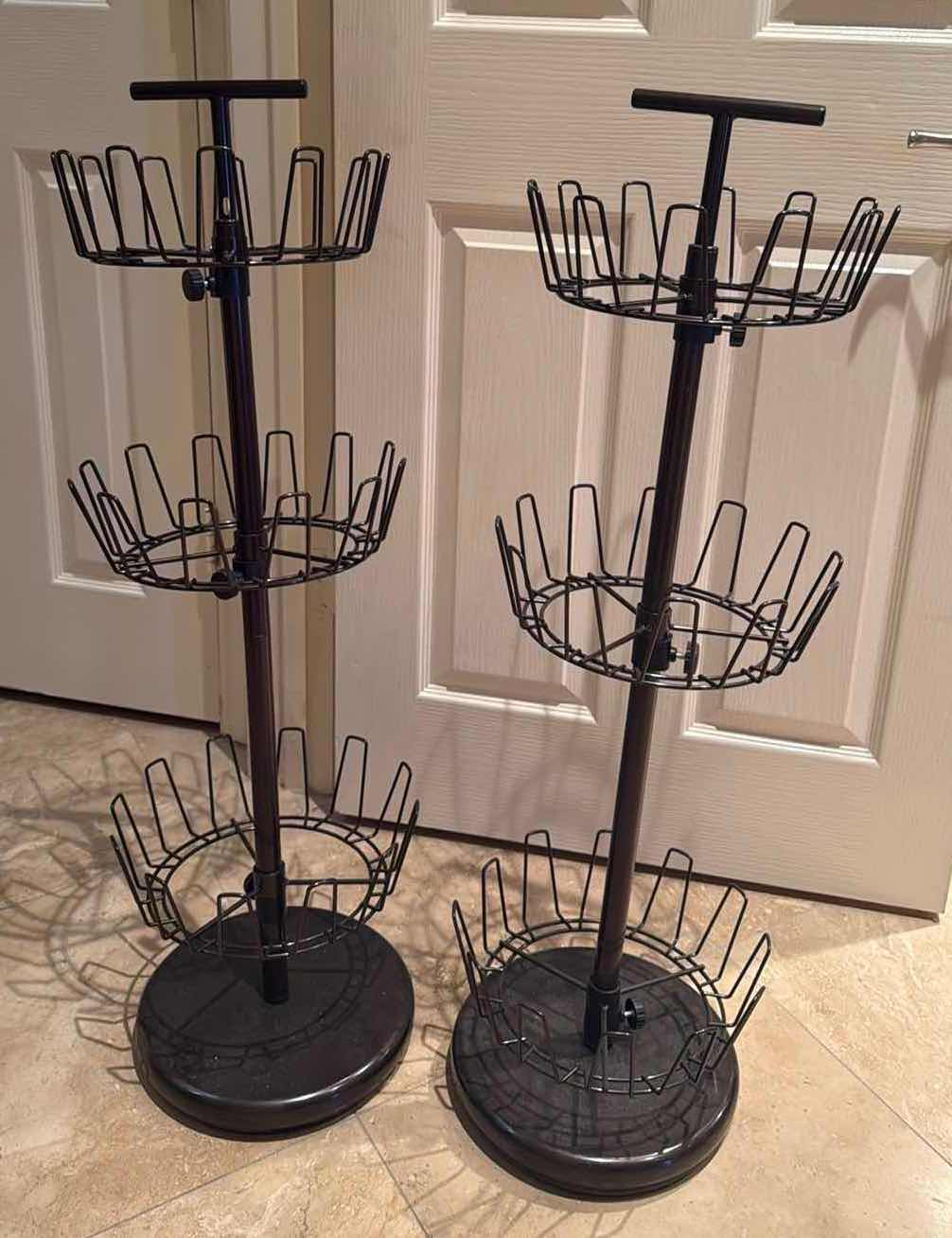 Photo 1 of 2-METAL ROUND SHOE RACKS H 26”