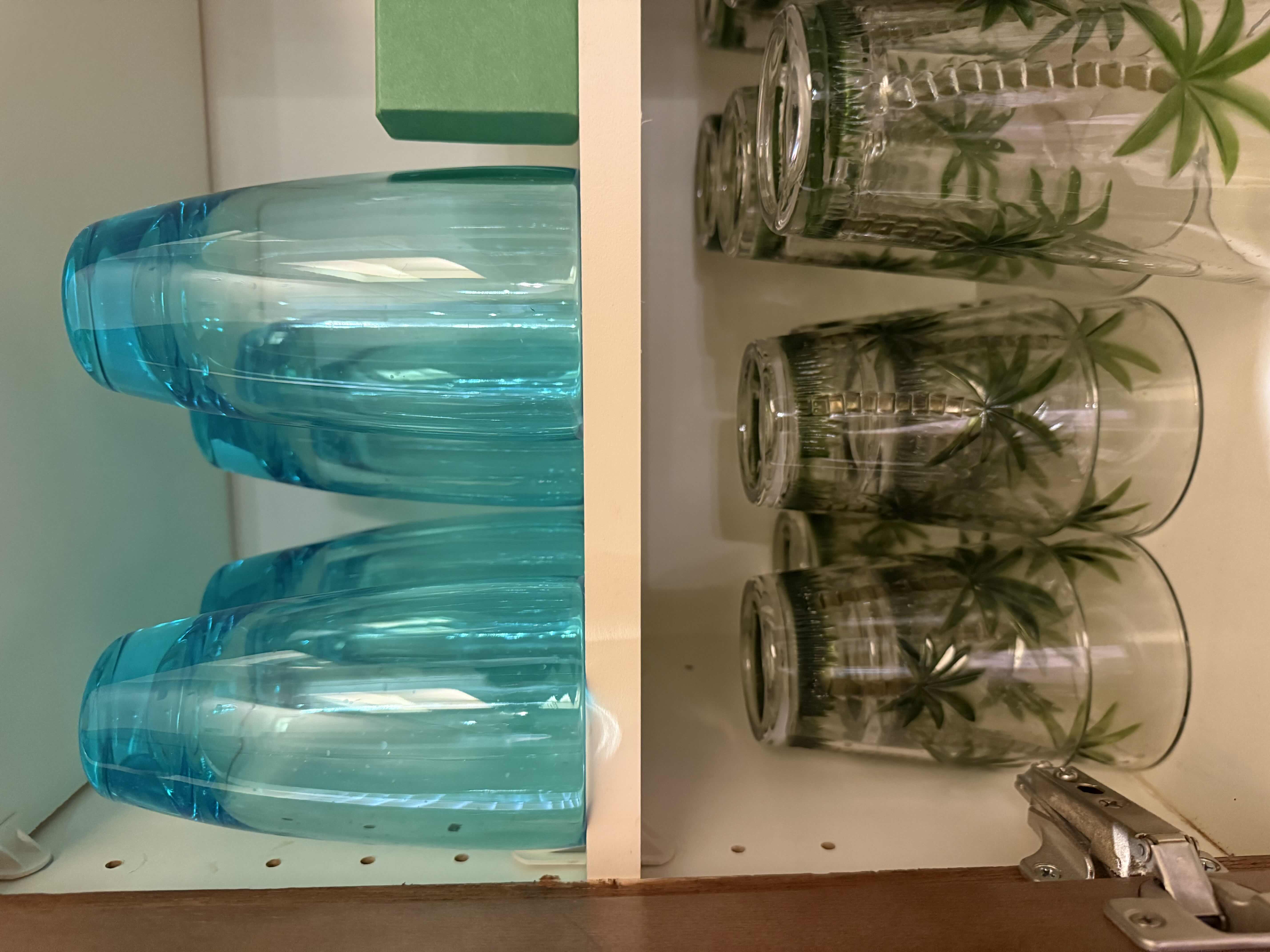 Photo 1 of CONTENTS OF KITCHEN CABINET-DRINKING GLASSES & SALT & PEPPER SHAKERS