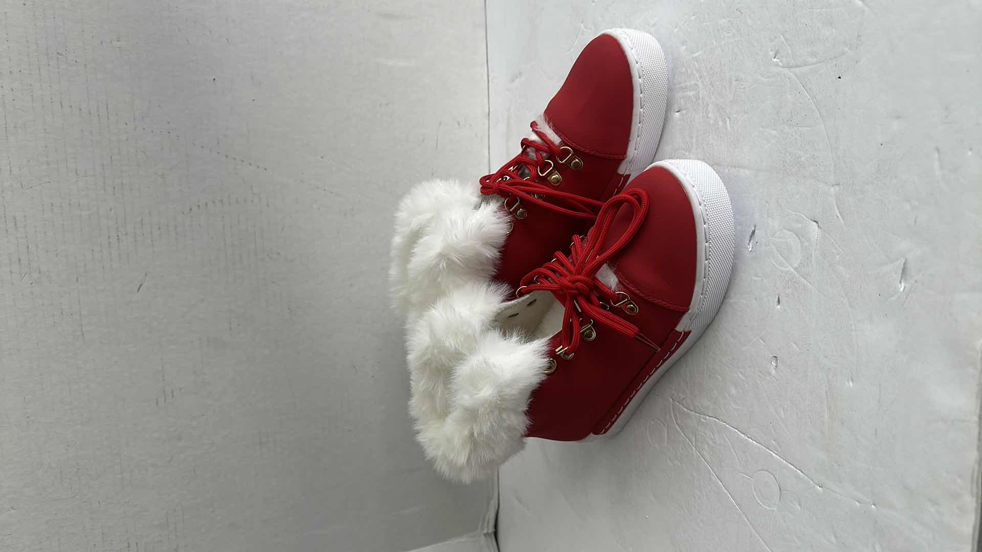 Photo 1 of NEW RED AND WHITE FUZZY SORS-SIZE 7