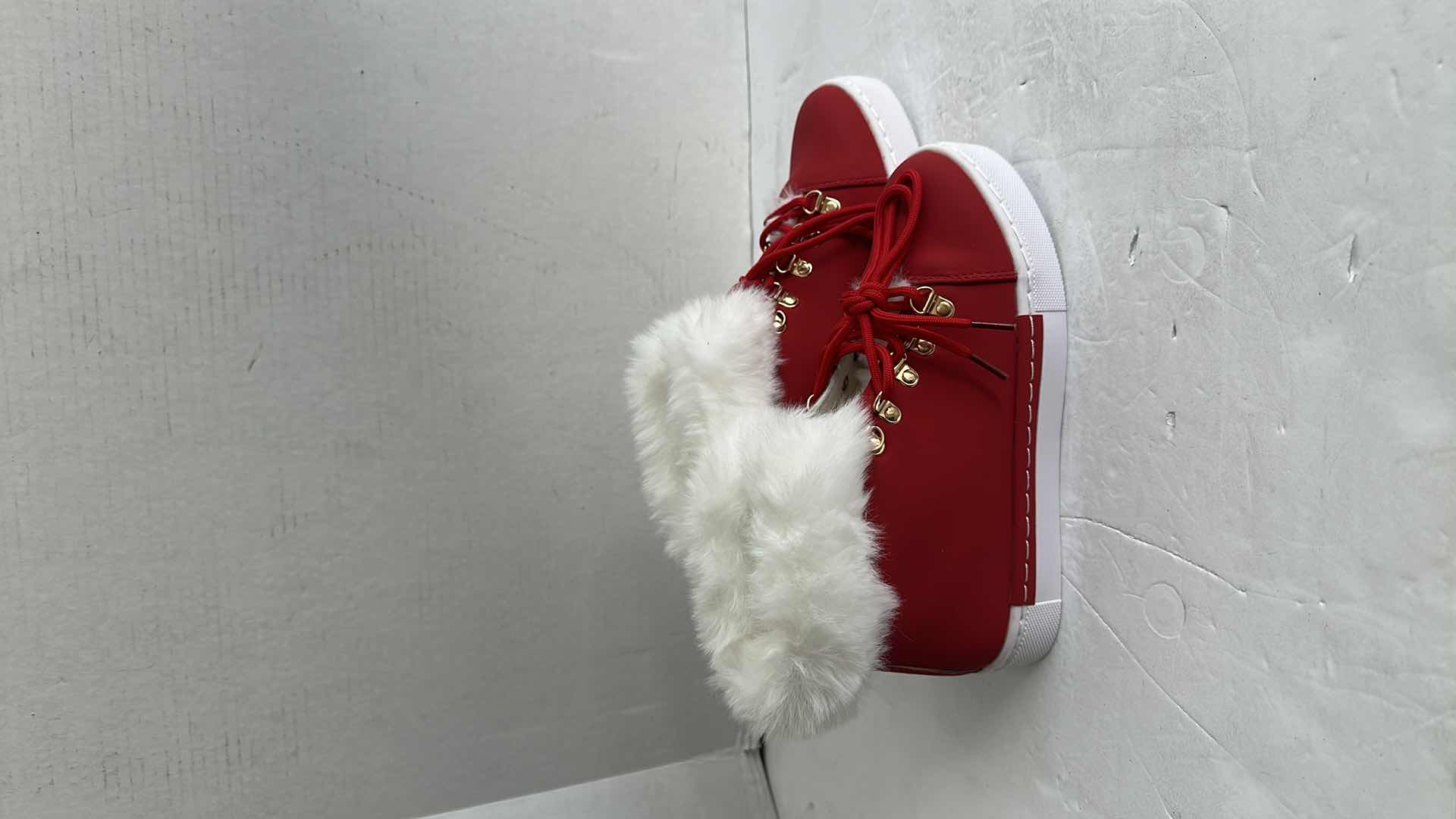 Photo 1 of NEW RED AND WHITE FUZZY SORS-SIZE 7