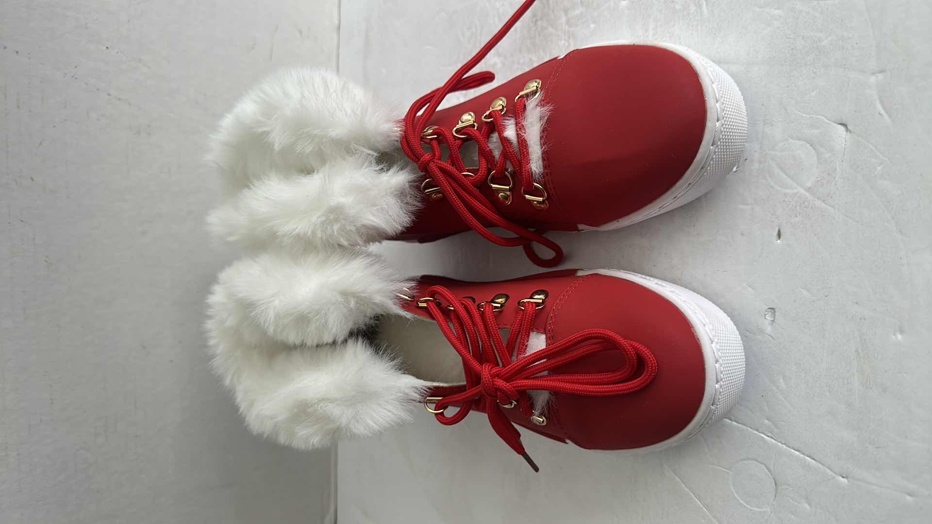 Photo 1 of NEW RED AND WHITE FUZZY SORS-SIZE 7