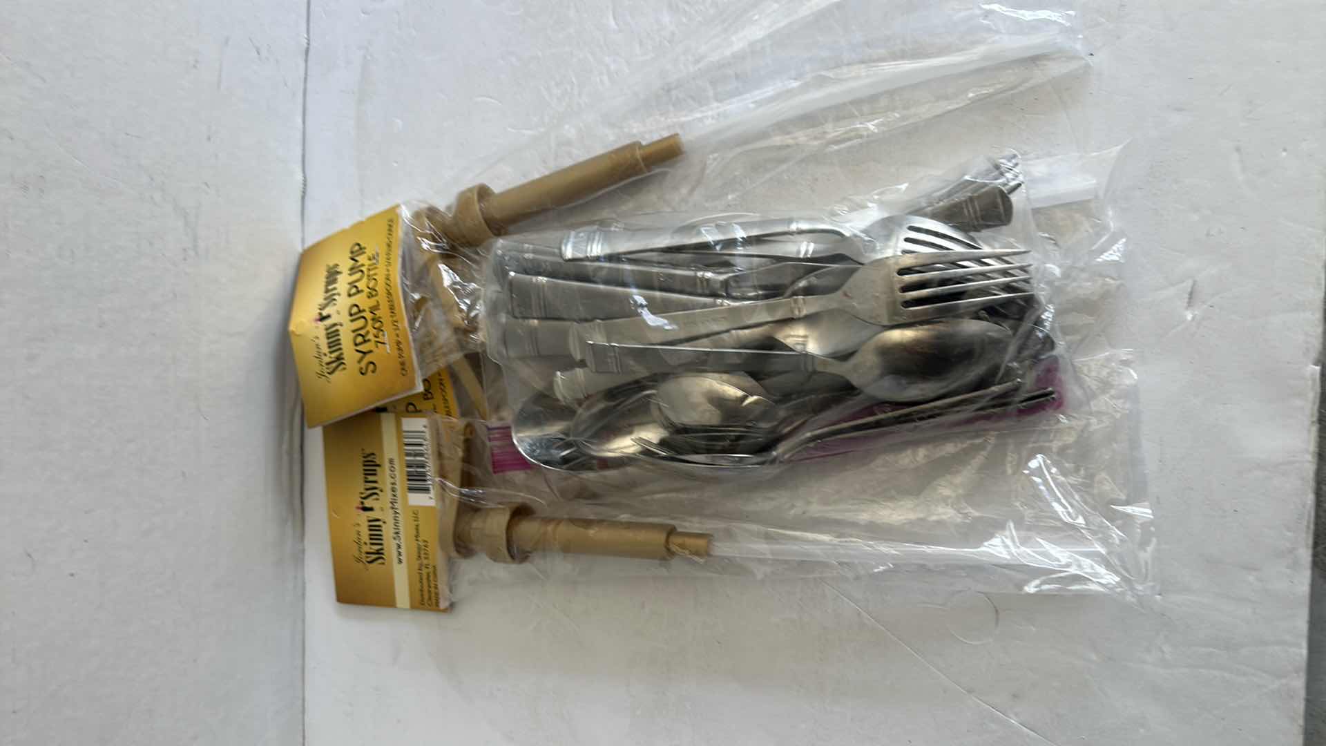 Photo 1 of SILVERWARE SET, 3-NEW SYRUP PUMPS