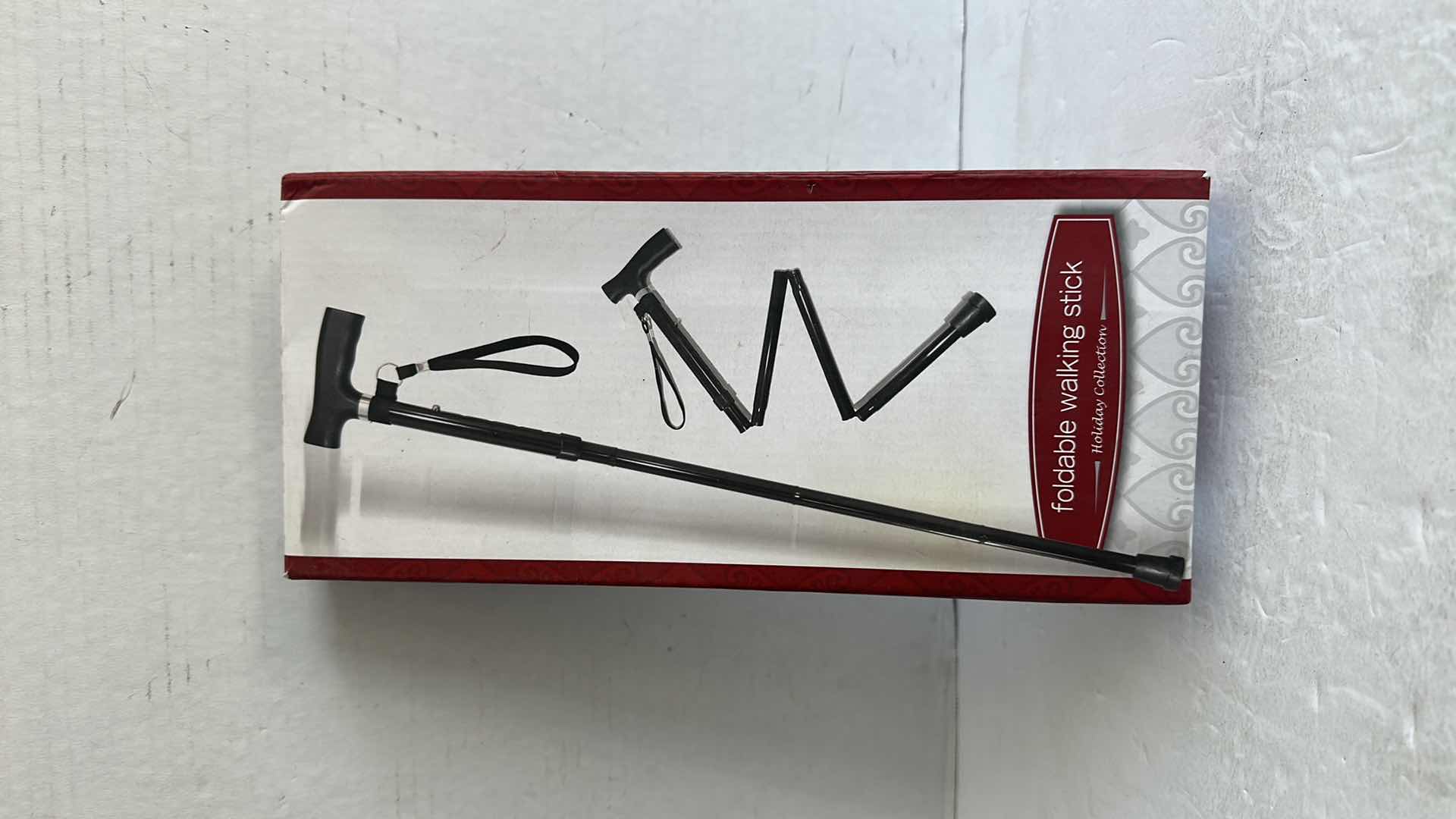 Photo 1 of HOLIDAY COLLECTION FOLDABLE WALKING STICK