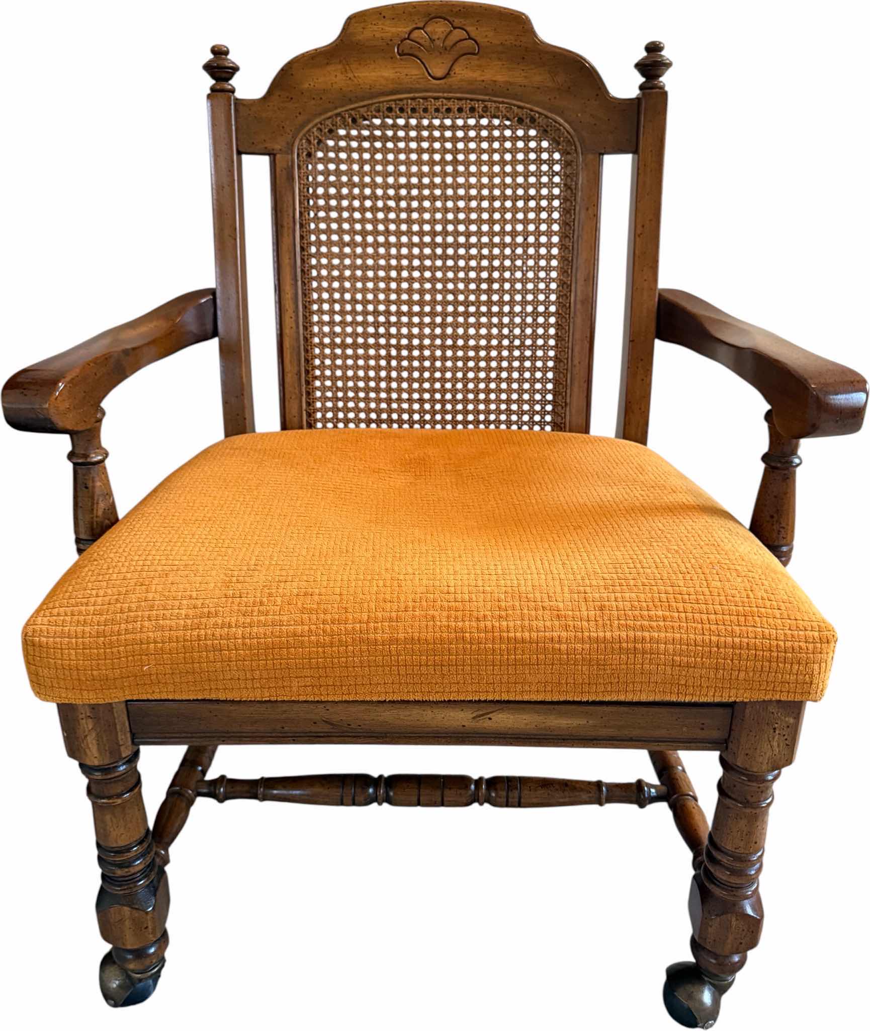 Photo 1 of VINTAGE WALNUT WOOD W CANE BACK DINING ARM CHAIR ON CASTERS W ORANGE CUSHION