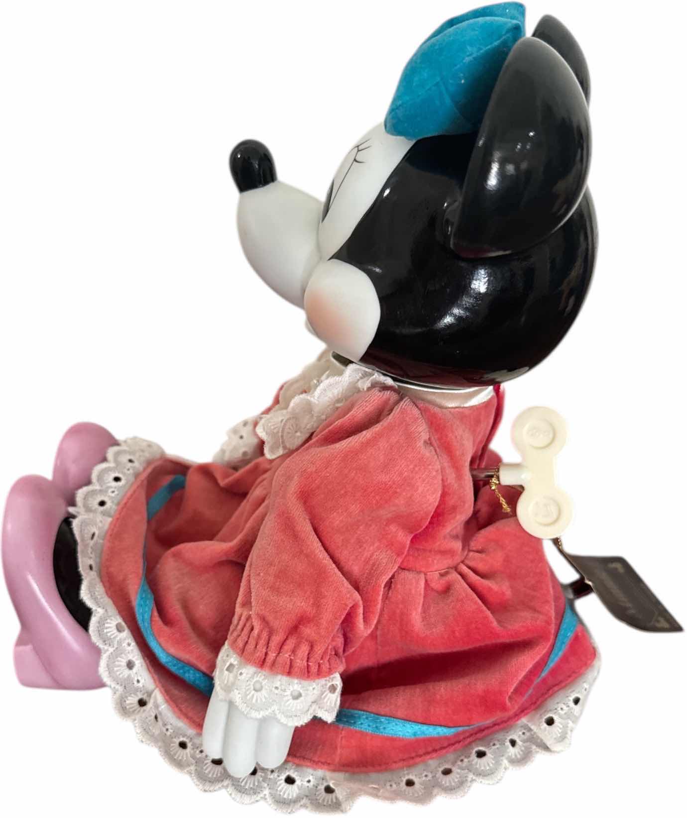 Photo 1 of VINTAGE PORCELAIN MINNIE MOUSE WIND UP MUSIC DOLL 

H9”