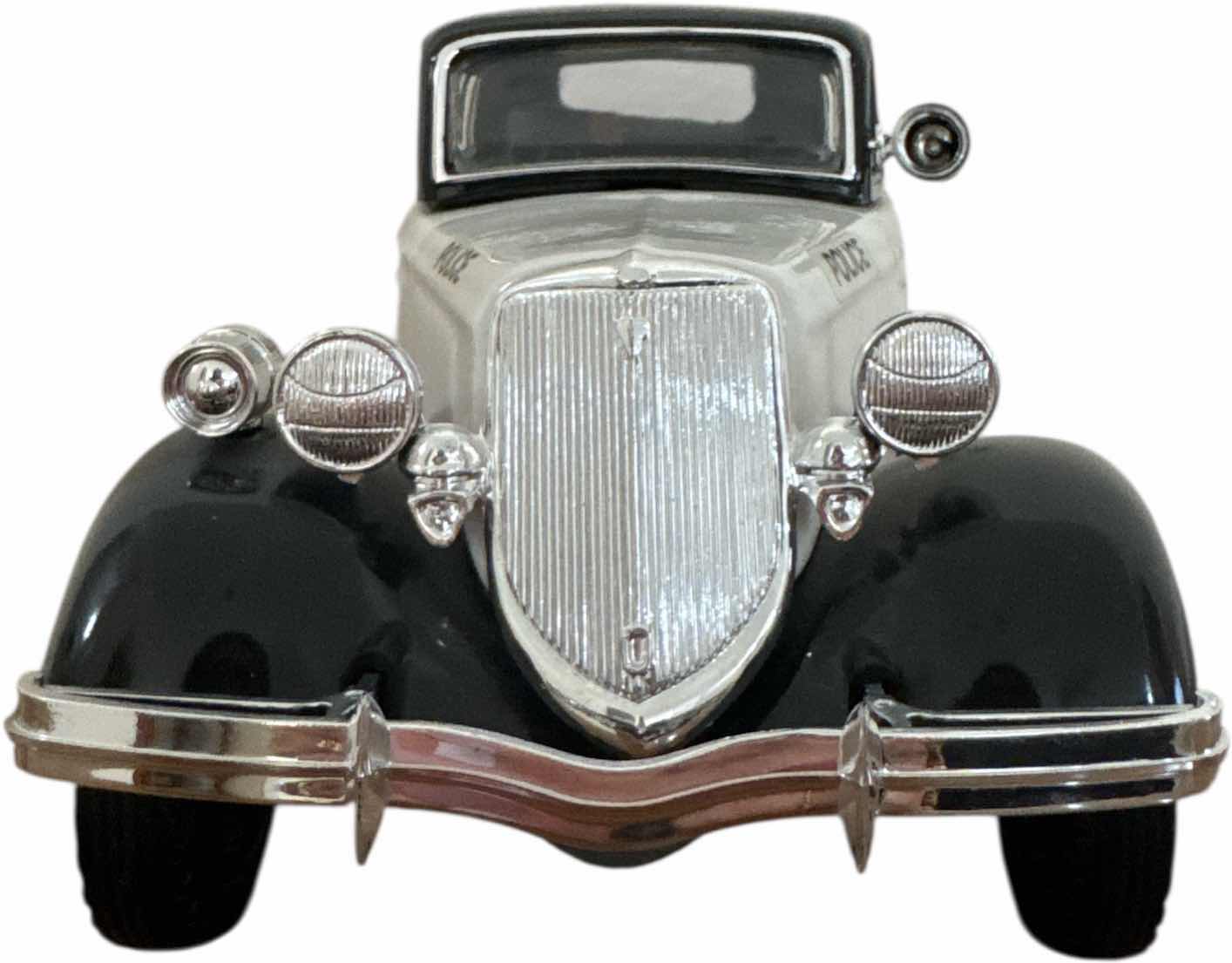 Photo 1 of VINTAGE JIM BEAM 1934 FORD MODEL A POLICE CAR DECANTER EMPTY

14” X 6” X H6”