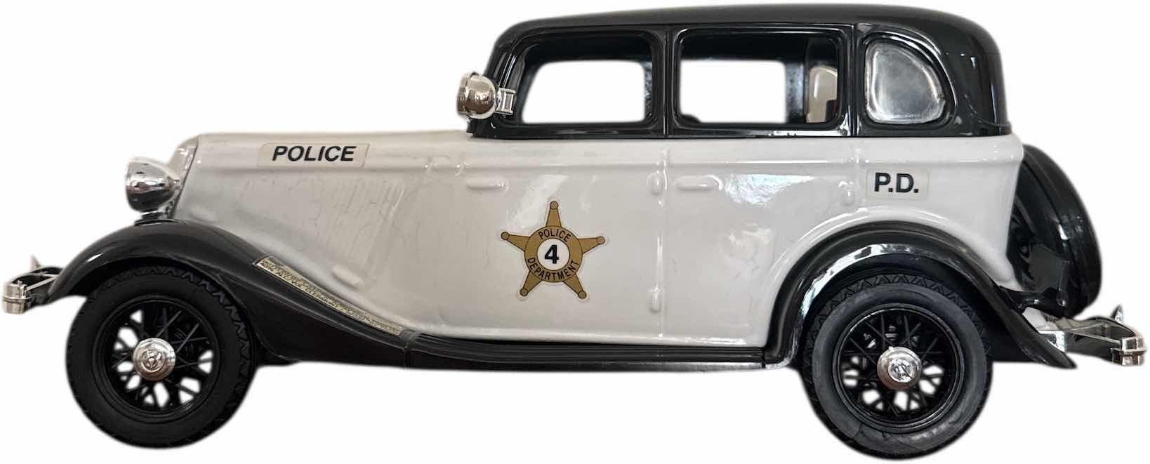 Photo 1 of VINTAGE JIM BEAM 1934 FORD MODEL A POLICE CAR DECANTER EMPTY
14” X 6” X H6”