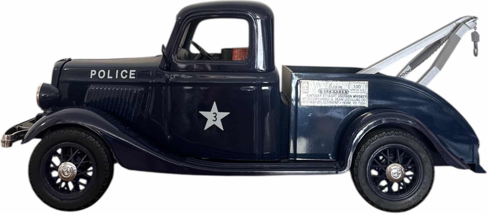Photo 1 of VINTAGE JIM BEAM 1935 FORD MODEL A POLICE TOW TRUCK DECANTER
14” X 6” X H5.5”