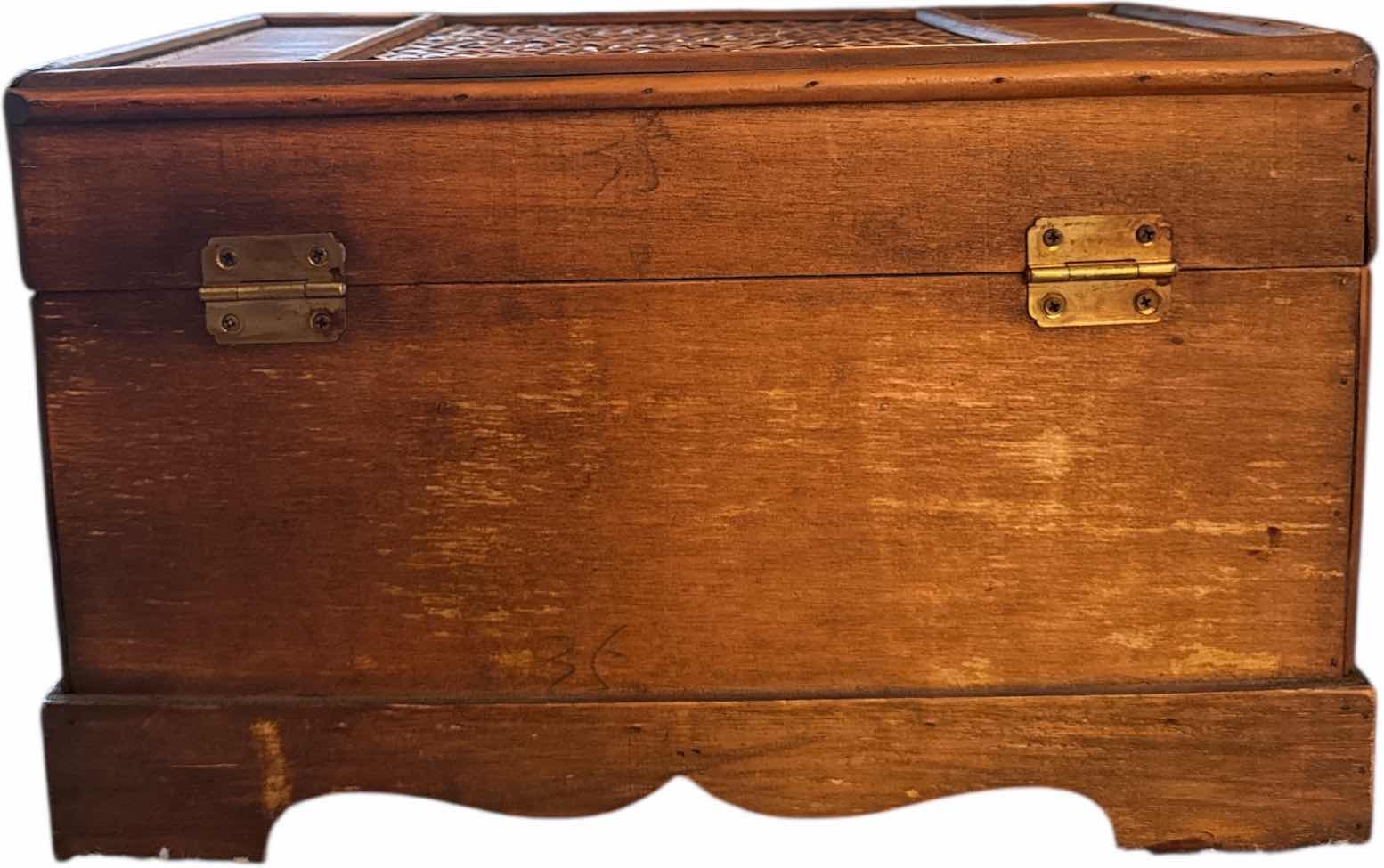 Photo 1 of VINTAGE BROWN WOOD AND WICKER WICKER TRUNK WITH METAL LATCH
14.24” X 8.75” X H9”