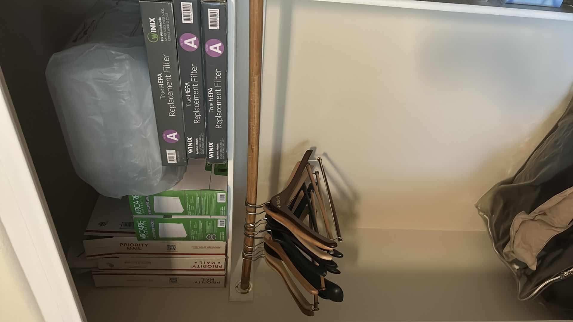 Photo 1 of CONTENTS OF CLOSET 2 QUEEN COMFORTER PILLOWS WOOD HANGERS