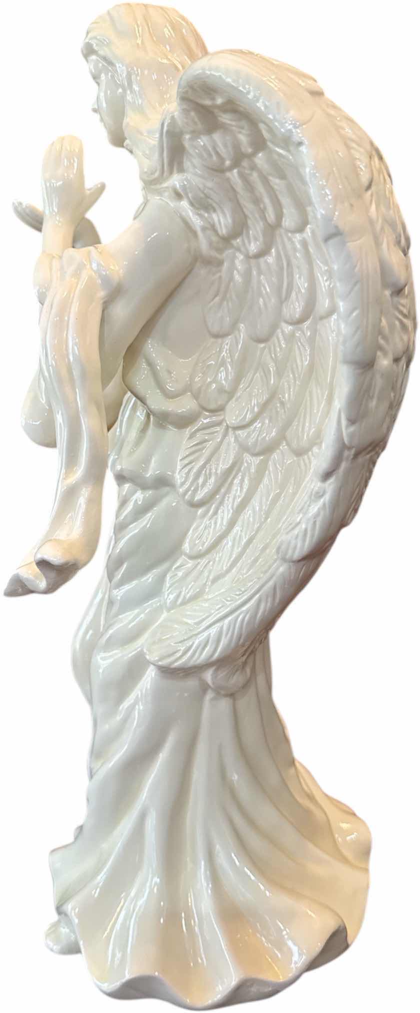 Photo 1 of VINTAGE WHITE CERAMIC ANGEL FIGURINE 
H15.5”