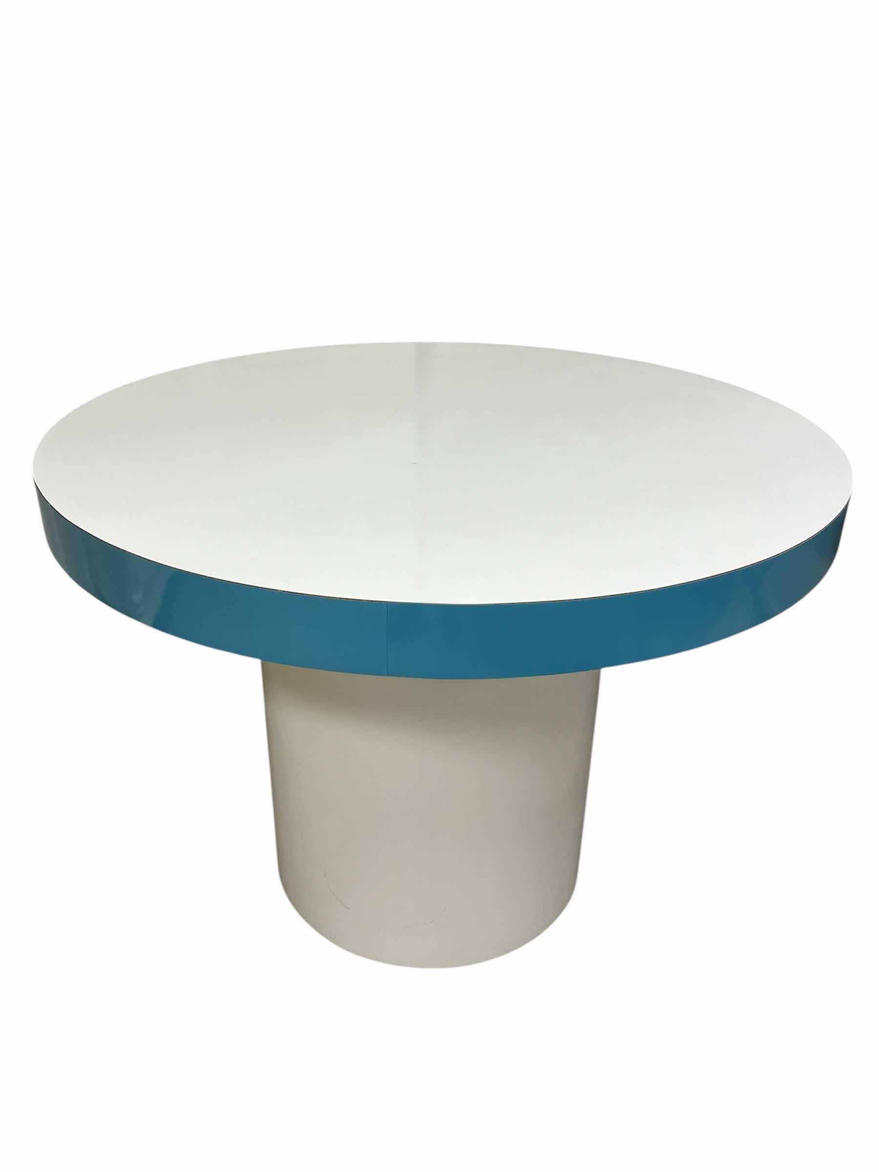 Photo 1 of MODERN WHITE & BLUE LAMINATE ROUND DINING TABLE 42” X 29”