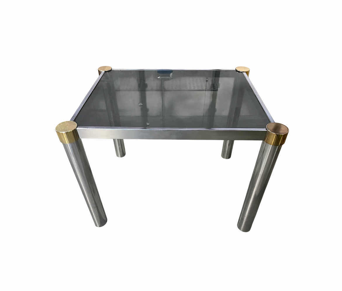 Photo 1 of GLASS TOP BRASS AND CHROME FINISH BASE SIDE TABLE 27” X 21” H20.5”