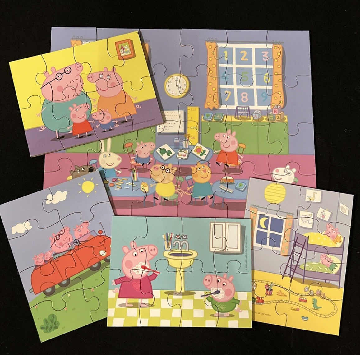 Photo 1 of WOOD JIGSAW PUZZLE SETS- PEPPA PIG 5 PUZZLE SET & COCOMELON 5 PUZZLE SET