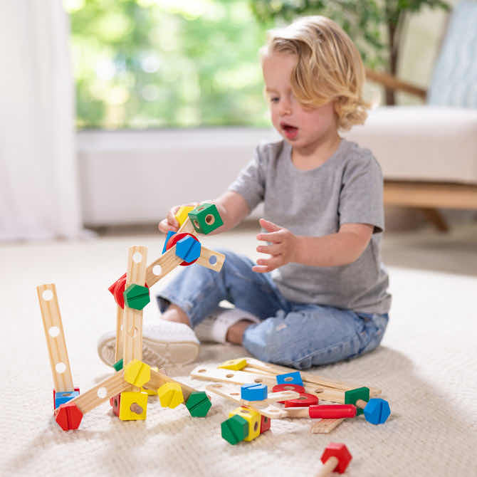 Photo 1 of NEW MELISSA & DOUG CONSTRUCTION SET IN A BOX, 48 WOODEN PCS