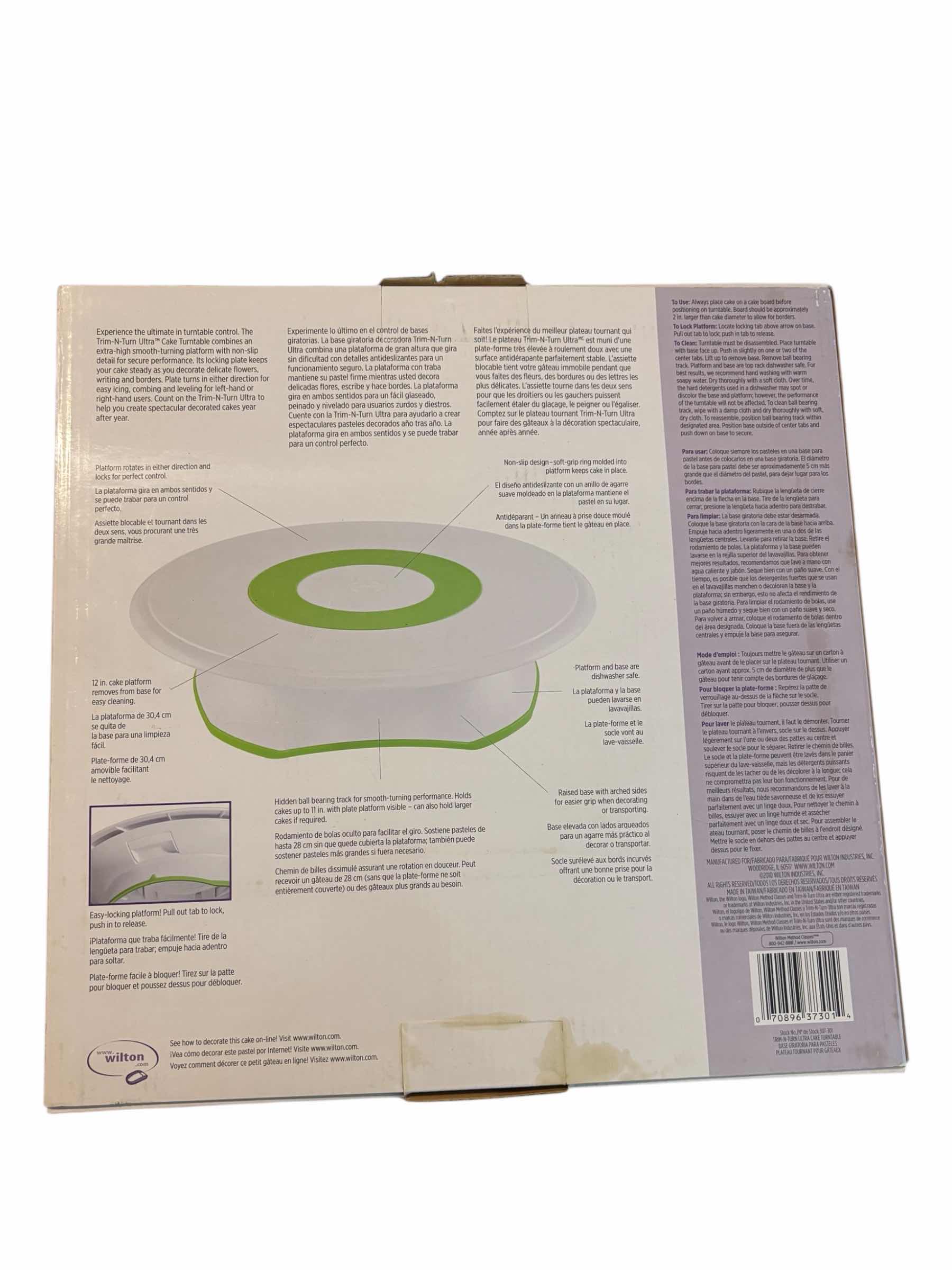 Photo 1 of WILTON TRIM 'N TURN ULTRA CAKE DECORATING 12” TURNTABLE, GREEN/WHITE