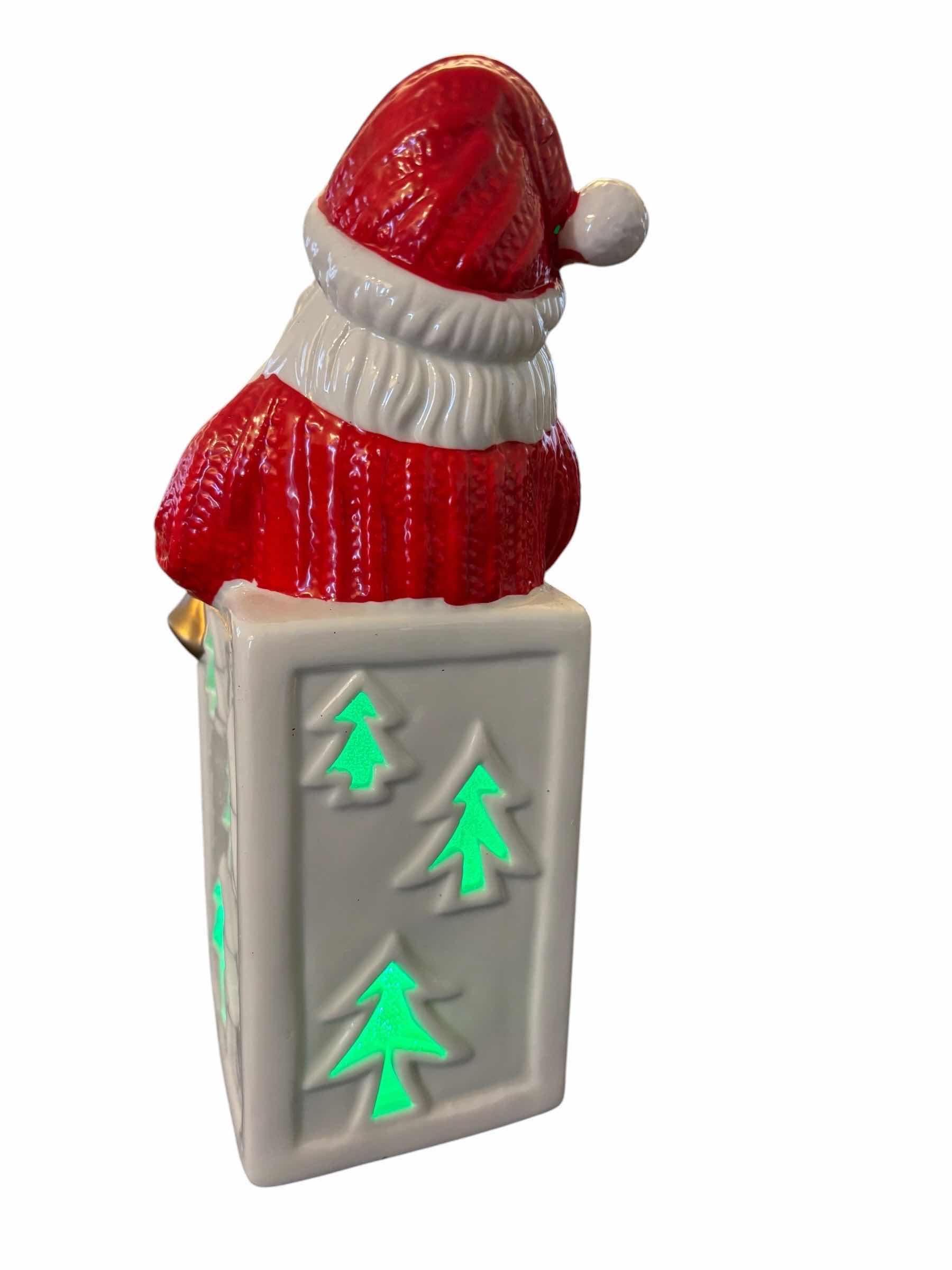 Photo 1 of LIGHT-UP CERAMIC 9.5” SANTA DECOR & 12 PC RED/SILVER GLASS MIRRORBALL ORNAMENTS IN DECORATIVE STORAGE BOX